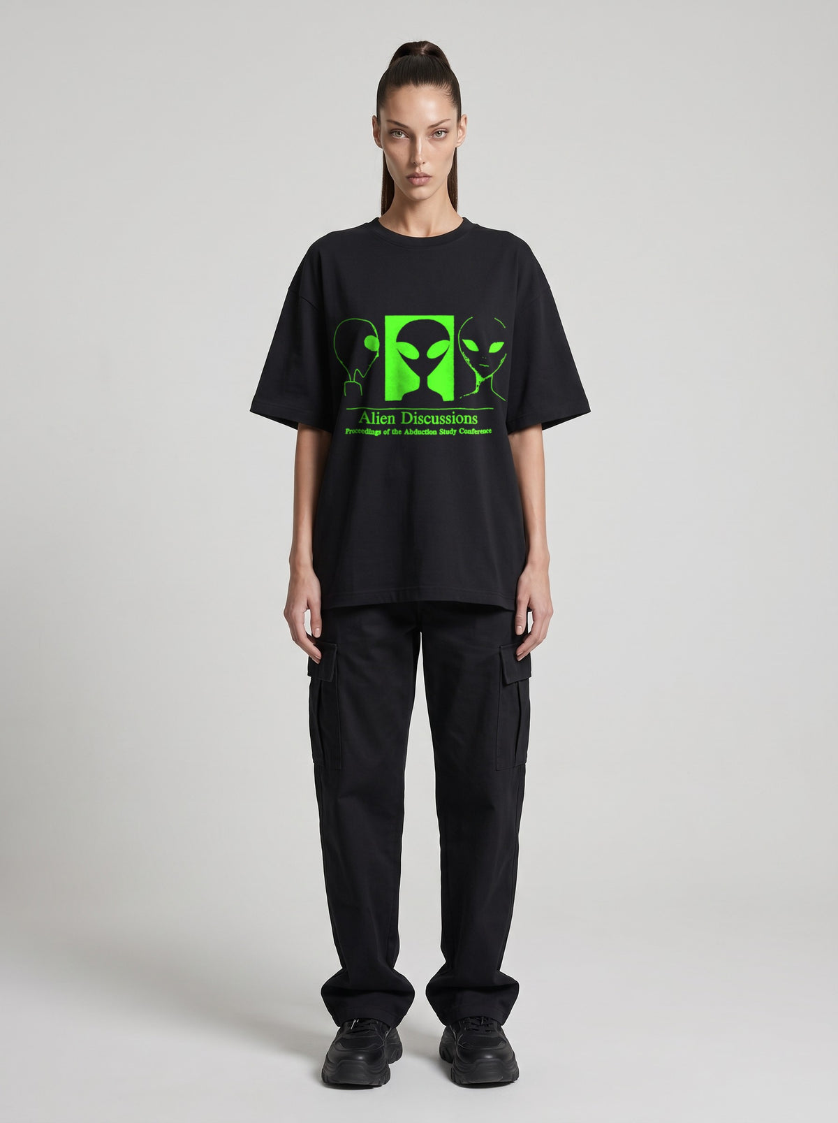 Alien Discussions Neon — Drop Shoulder T-Shirt in Black Beauty, front, worn by female model