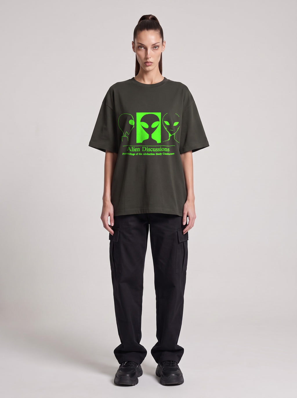 Alien Discussions Neon — Drop Shoulder T-Shirt in Dark Gray, front, worn by female model