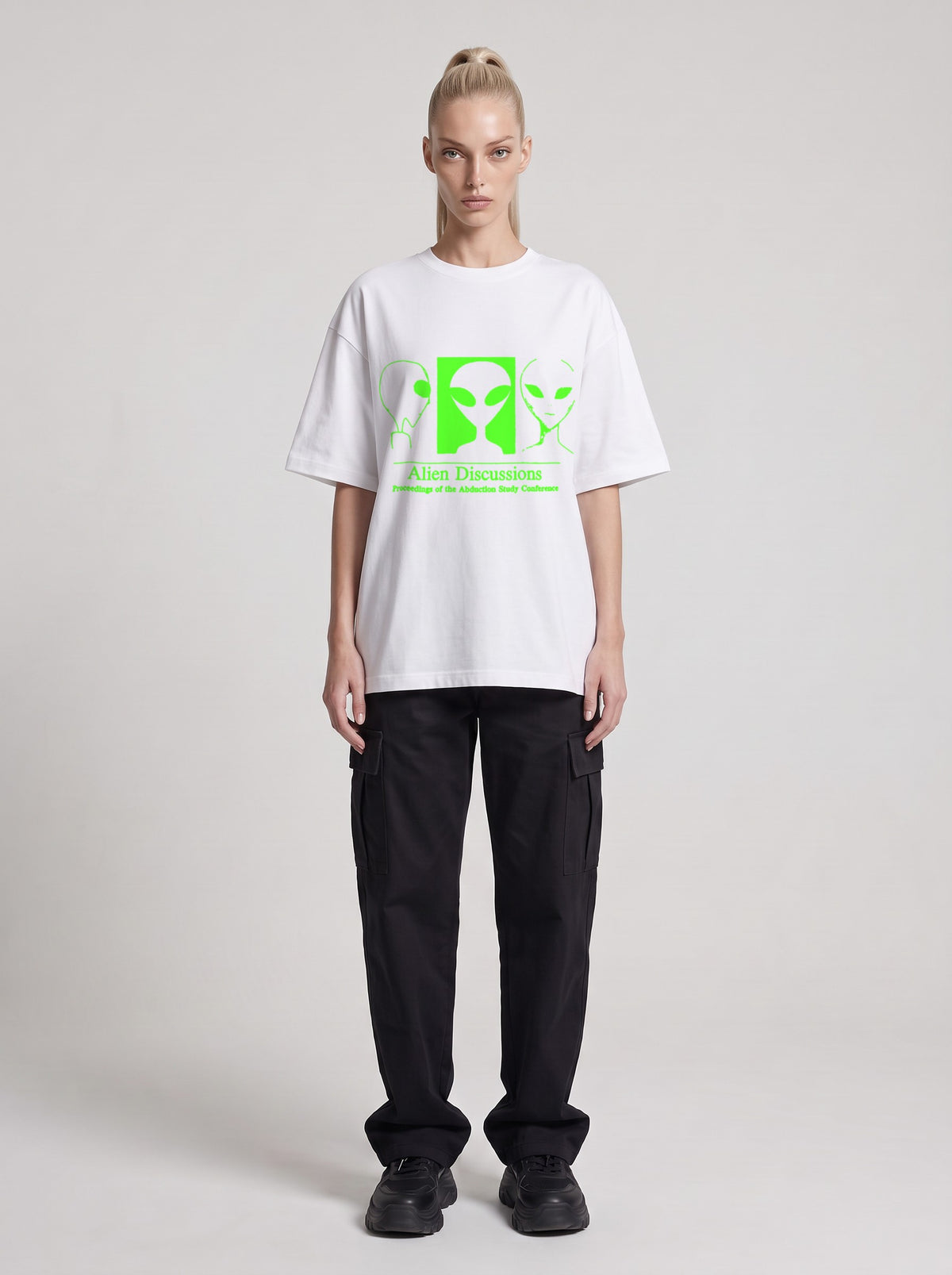 Alien Discussions Neon — Drop Shoulder T-Shirt in Lucent White, front, worn by female model