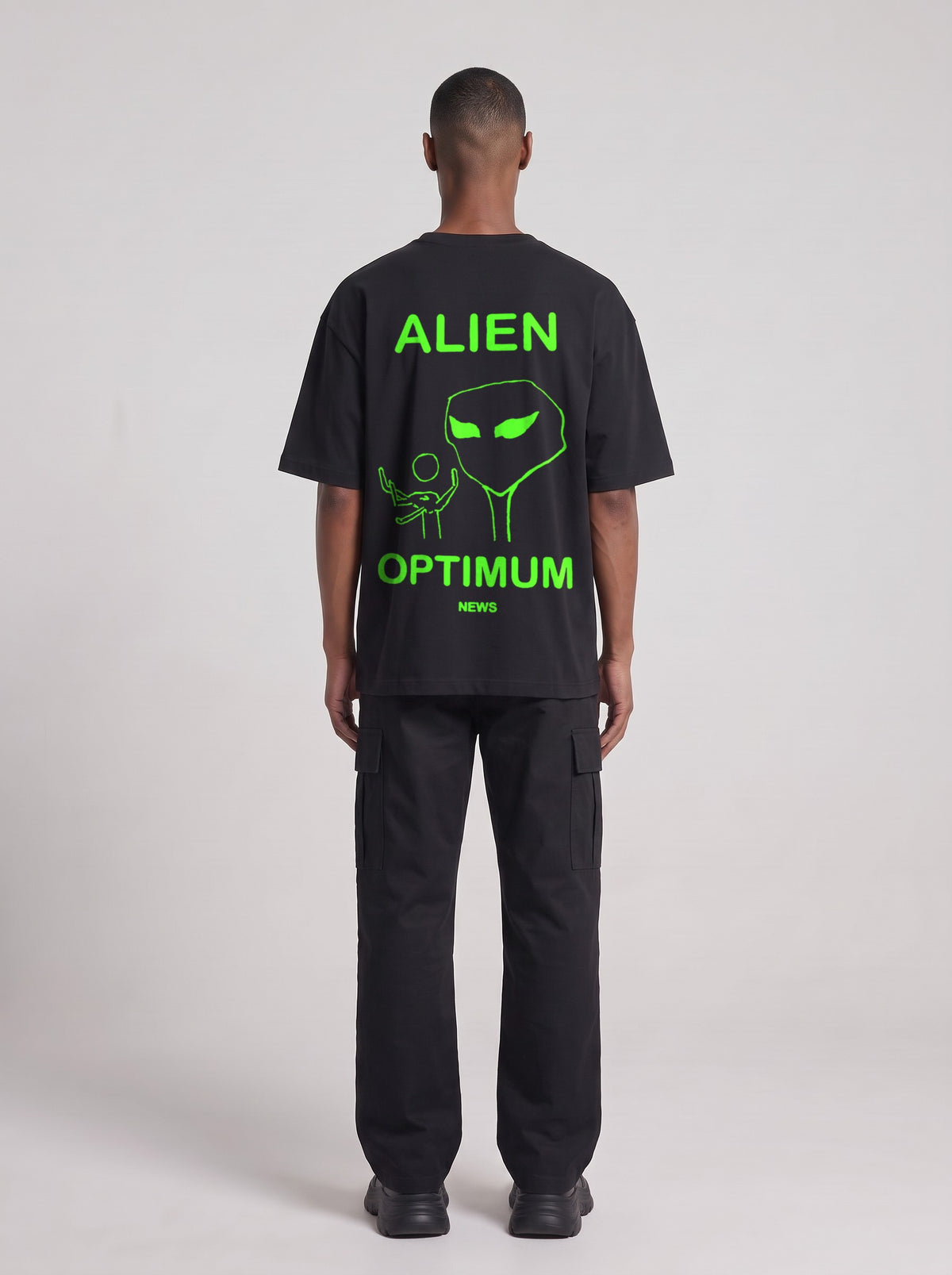 Alien Optimum Neon — Drop Shoulder T-Shirt in Black Beauty, back, worn by male model