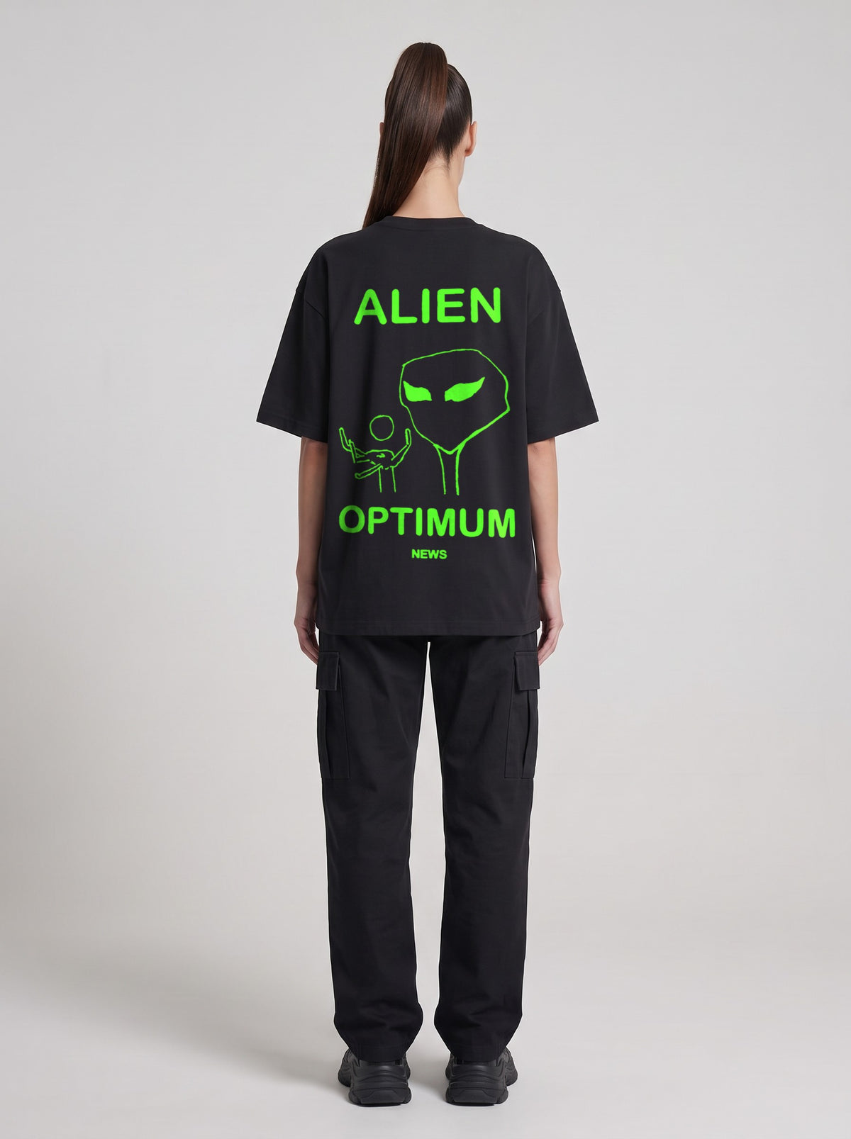 Alien Optimum Neon — Drop Shoulder T-Shirt in Black Beauty, back, worn by female model
