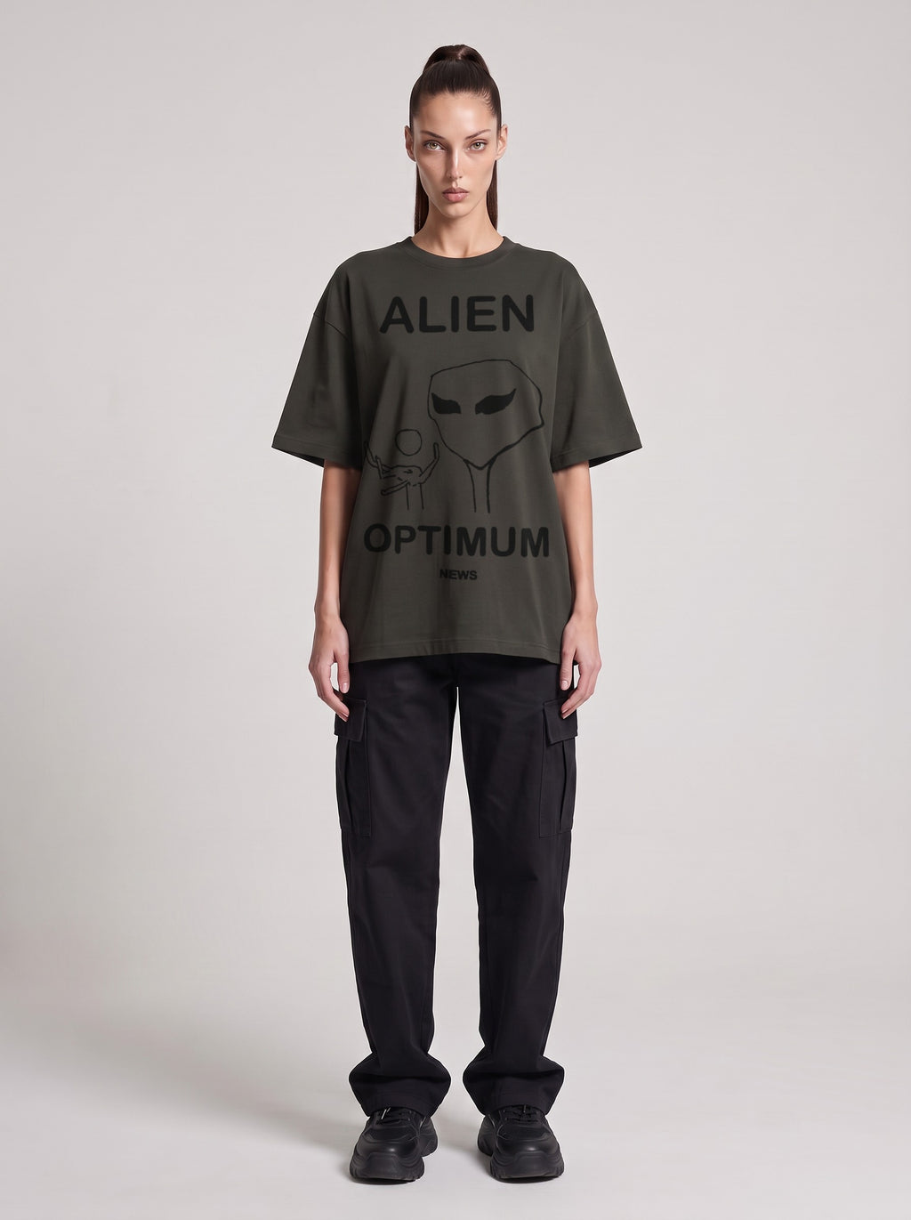 Alien Optimum — Drop Shoulder T-Shirt in Dark Gray, front, worn by female model