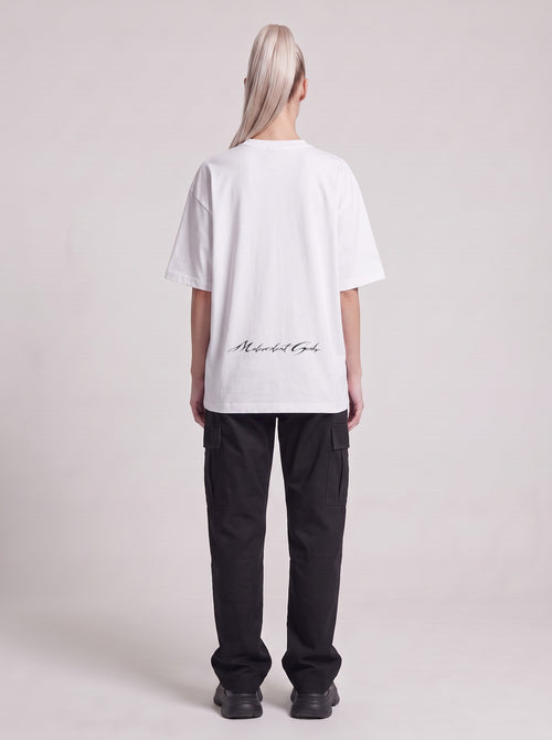 Alien Optimum — Drop Shoulder T-Shirt in White, back, worn by female model