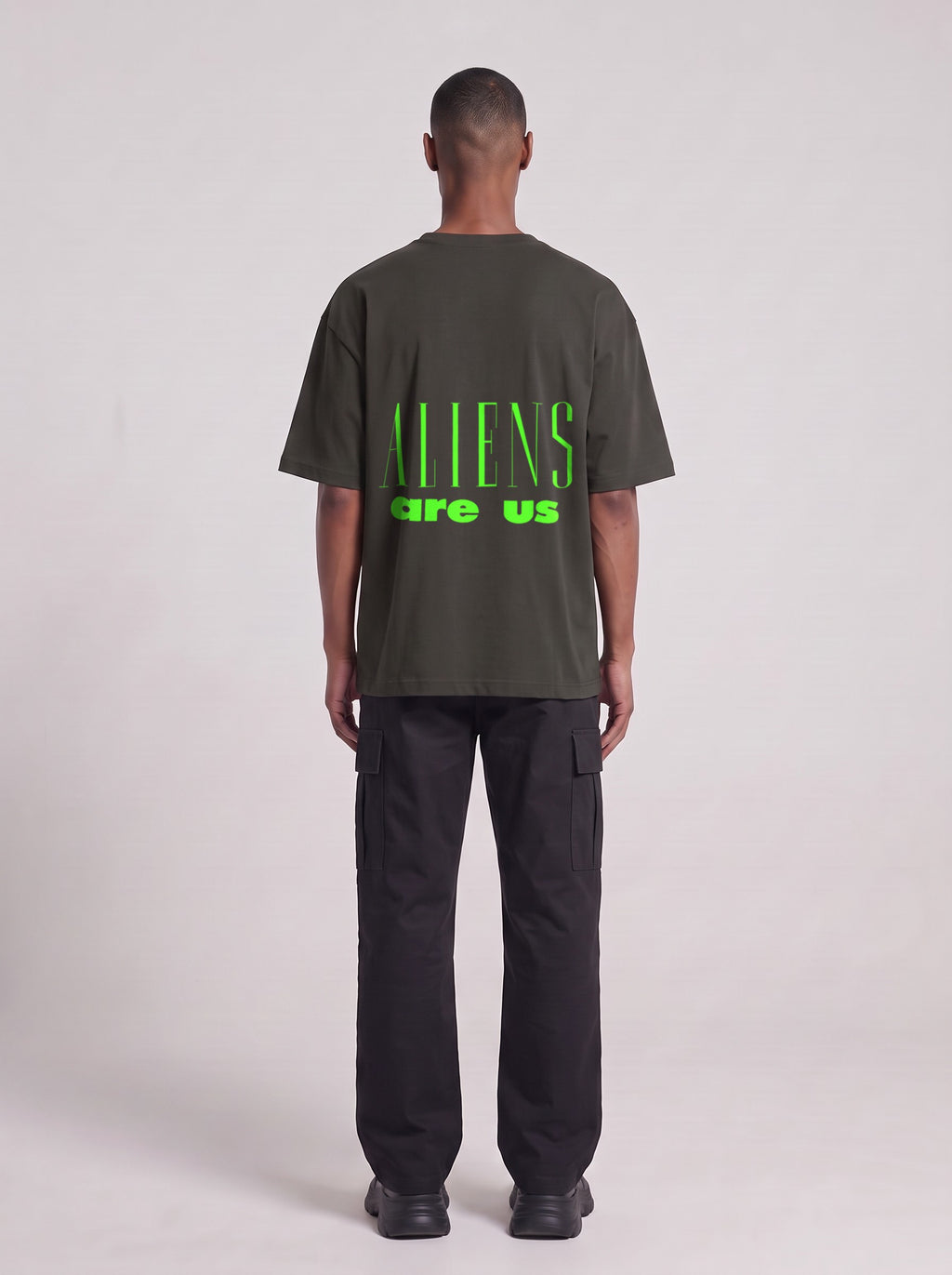 Aliens Are Us Neon — Drop Shoulder T-Shirt in Dark Gray, back, worn by male model