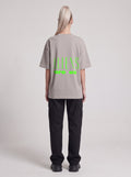 Aliens Are Us Neon — Drop Shoulder T-Shirt in Light Gray, back, worn by female model