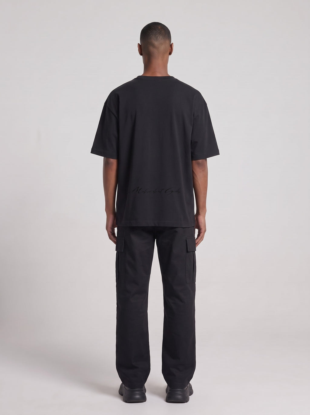 Anomalous Experience — Drop Shoulder T-Shirt in Black Beauty, back, worn by male model