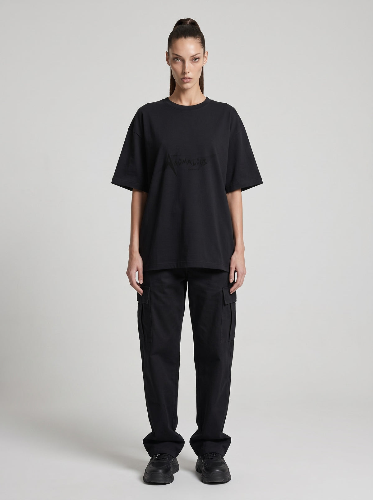 Anomalous Experience — Drop Shoulder T-Shirt in Black Beauty, front, worn by female model