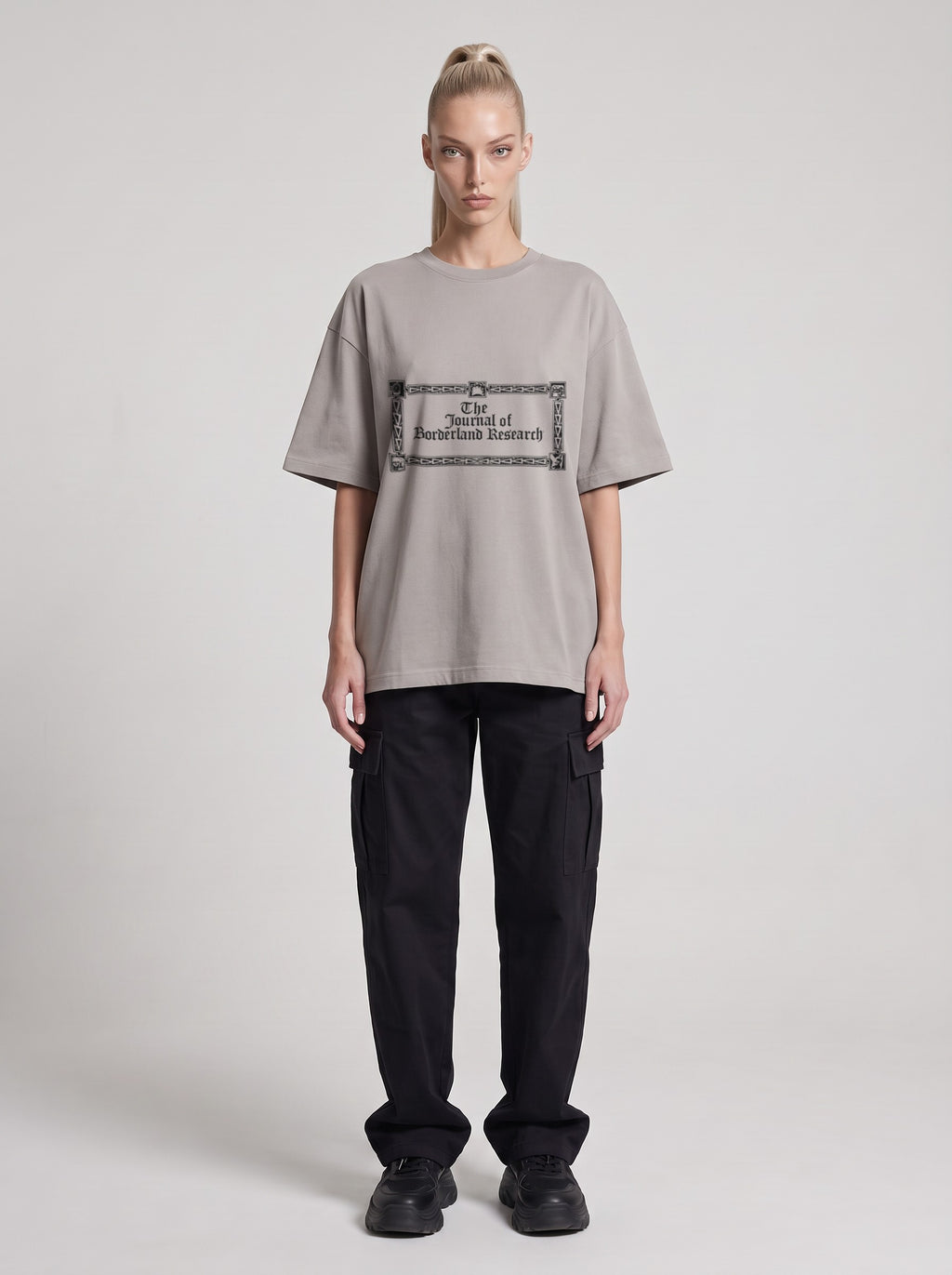 Borderland Research — Drop Shoulder T-Shirt in Light Gray, front, worn by female model