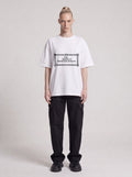 Borderland Research — Drop Shoulder T-Shirt in Lucent White, front, worn by male model