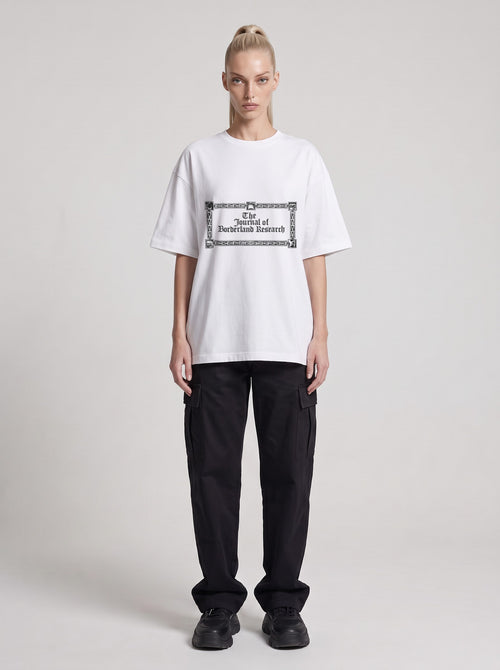 Borderland Research — Drop Shoulder T-Shirt in Lucent White, front, worn by female model