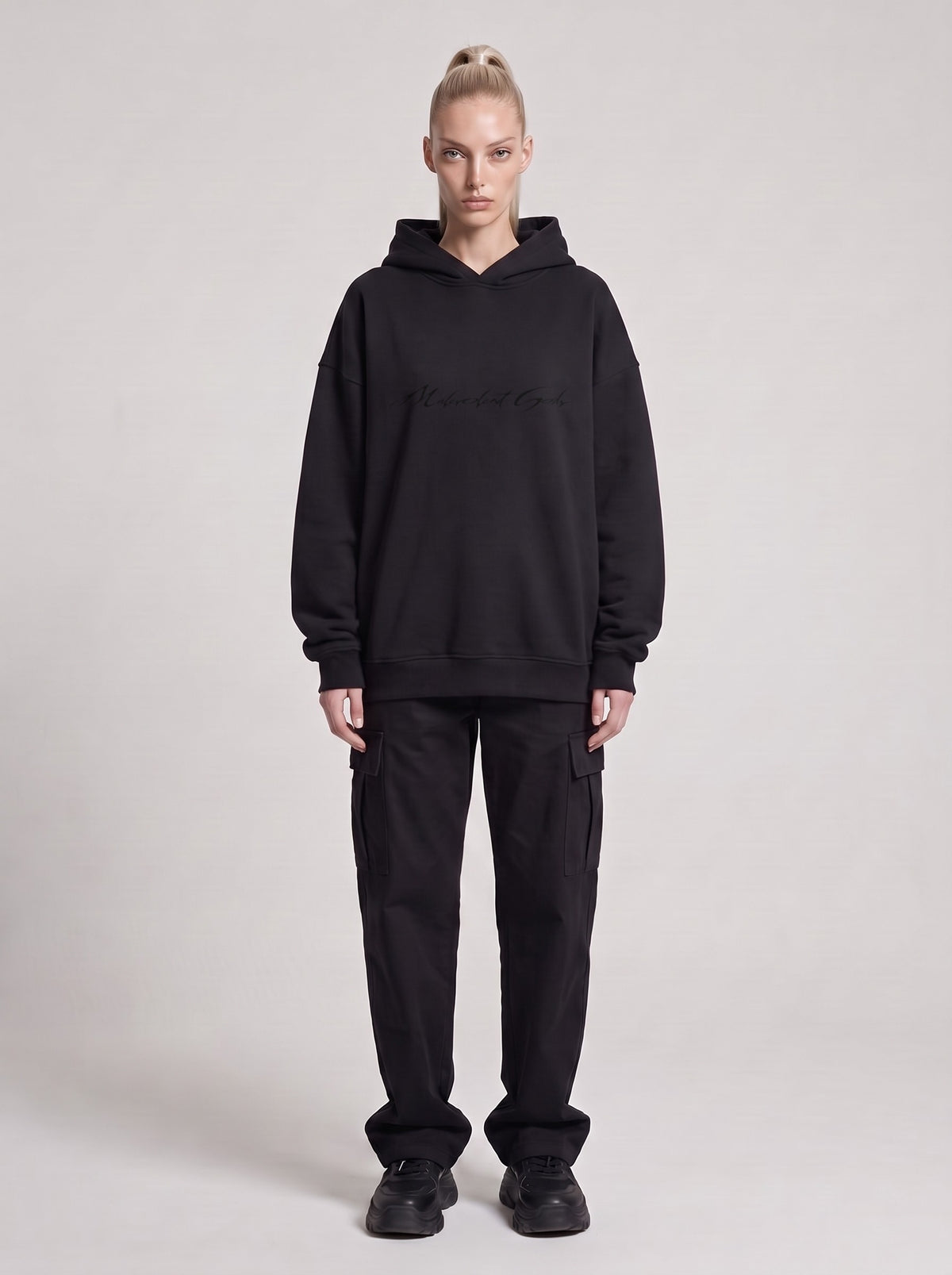Gemini — Boxy Hoodie in Black, front, worn by male model