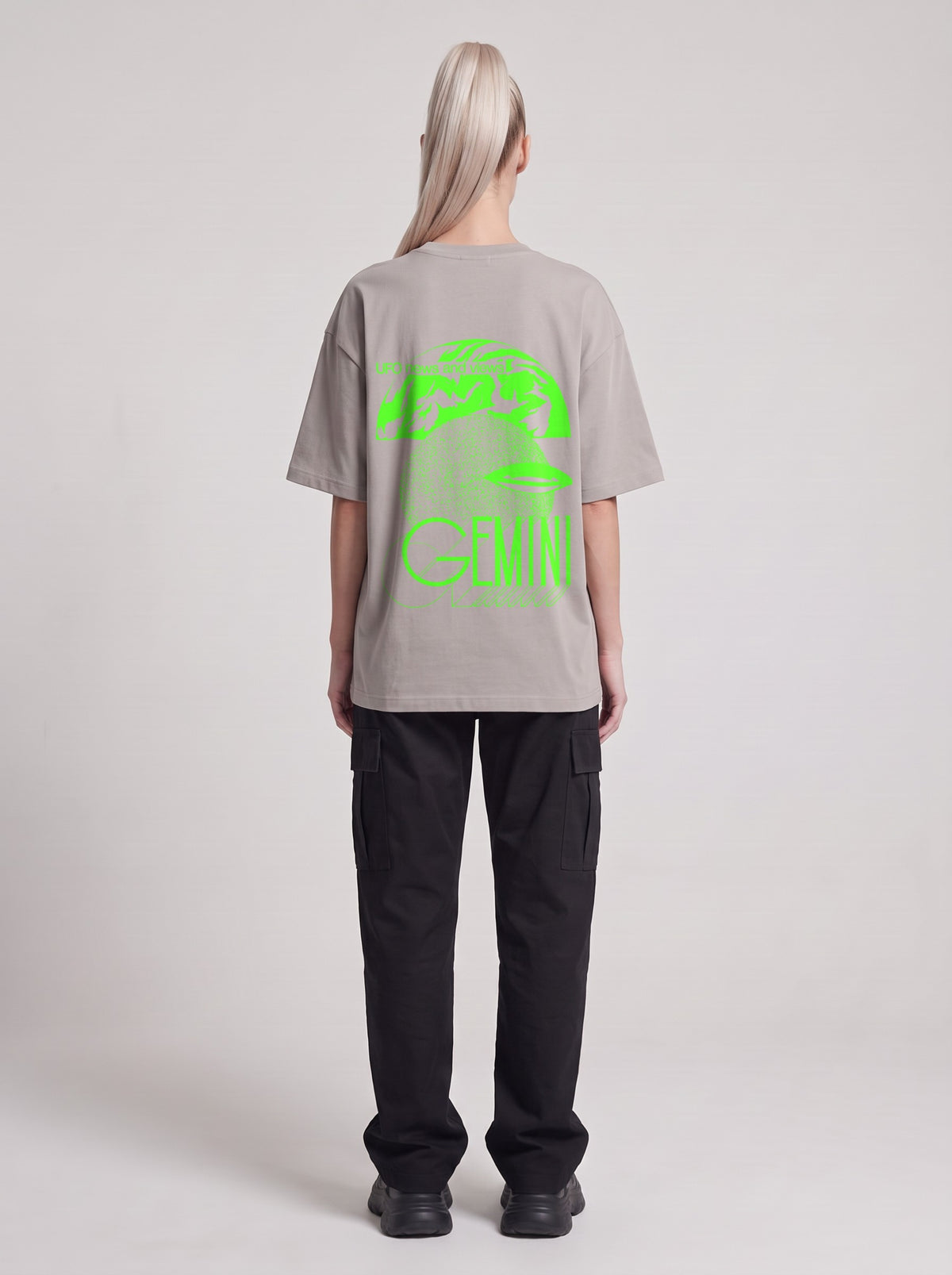 Gemini Neon — Drop Shoulder T-Shirt in Light Gray, back, worn by female model