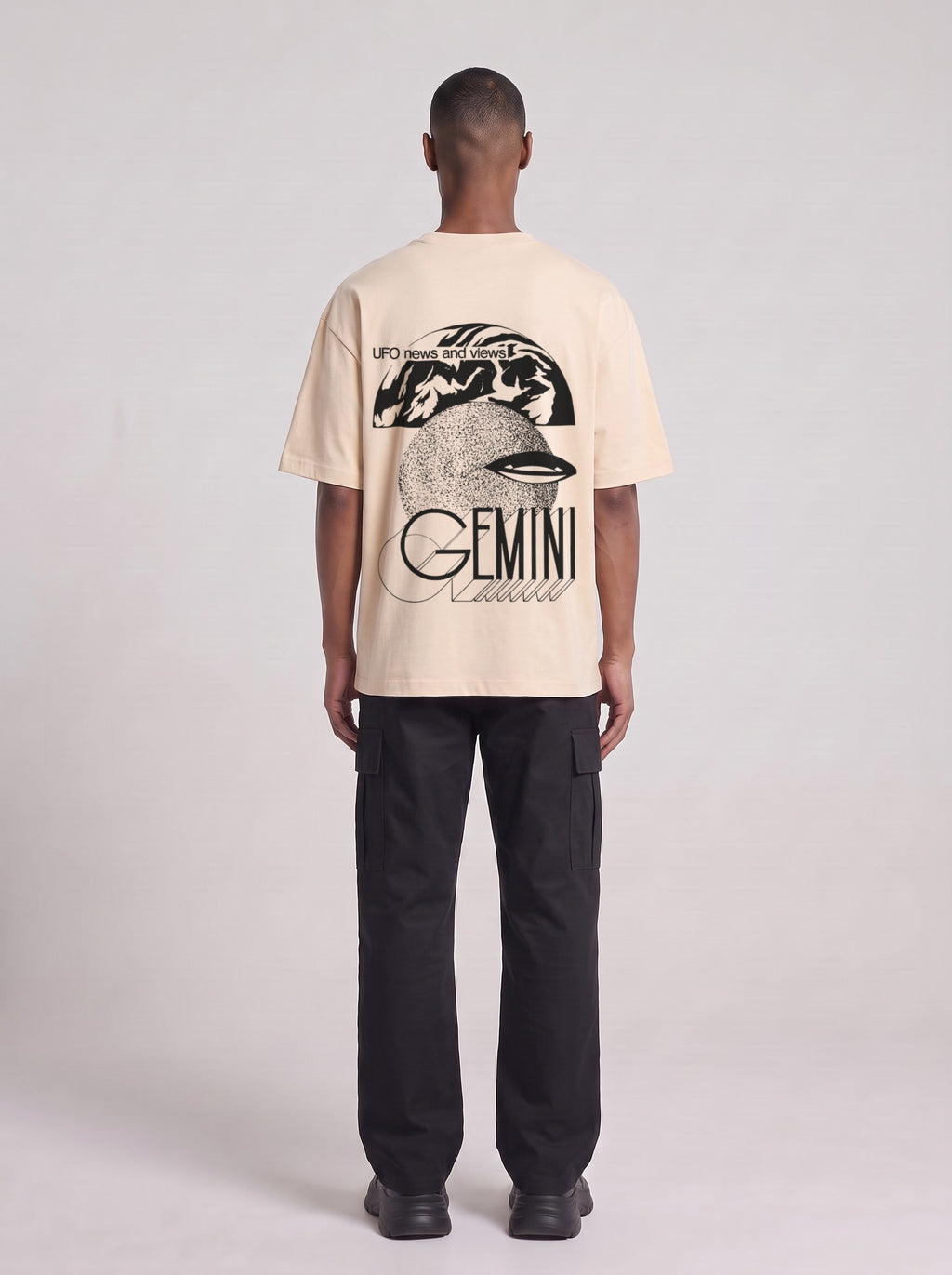 Gemini — Drop Shoulder T-Shirt in Light Apricot, back, worn by male model