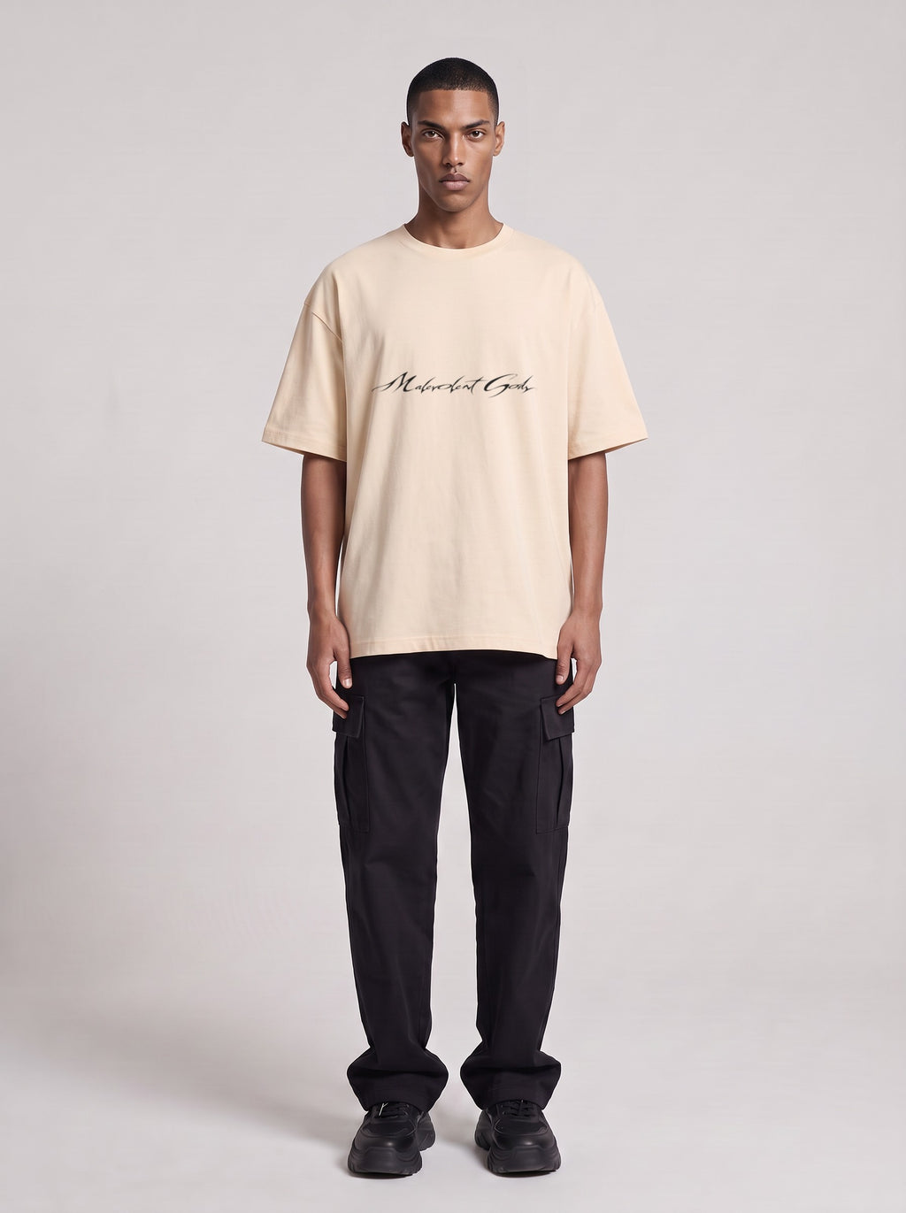 Gemini — Drop Shoulder T-Shirt in Light Apricot, front, worn by male model