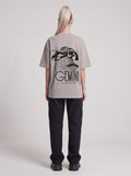 Gemini — Drop Shoulder T-Shirt in Light Gray, back, worn by female model