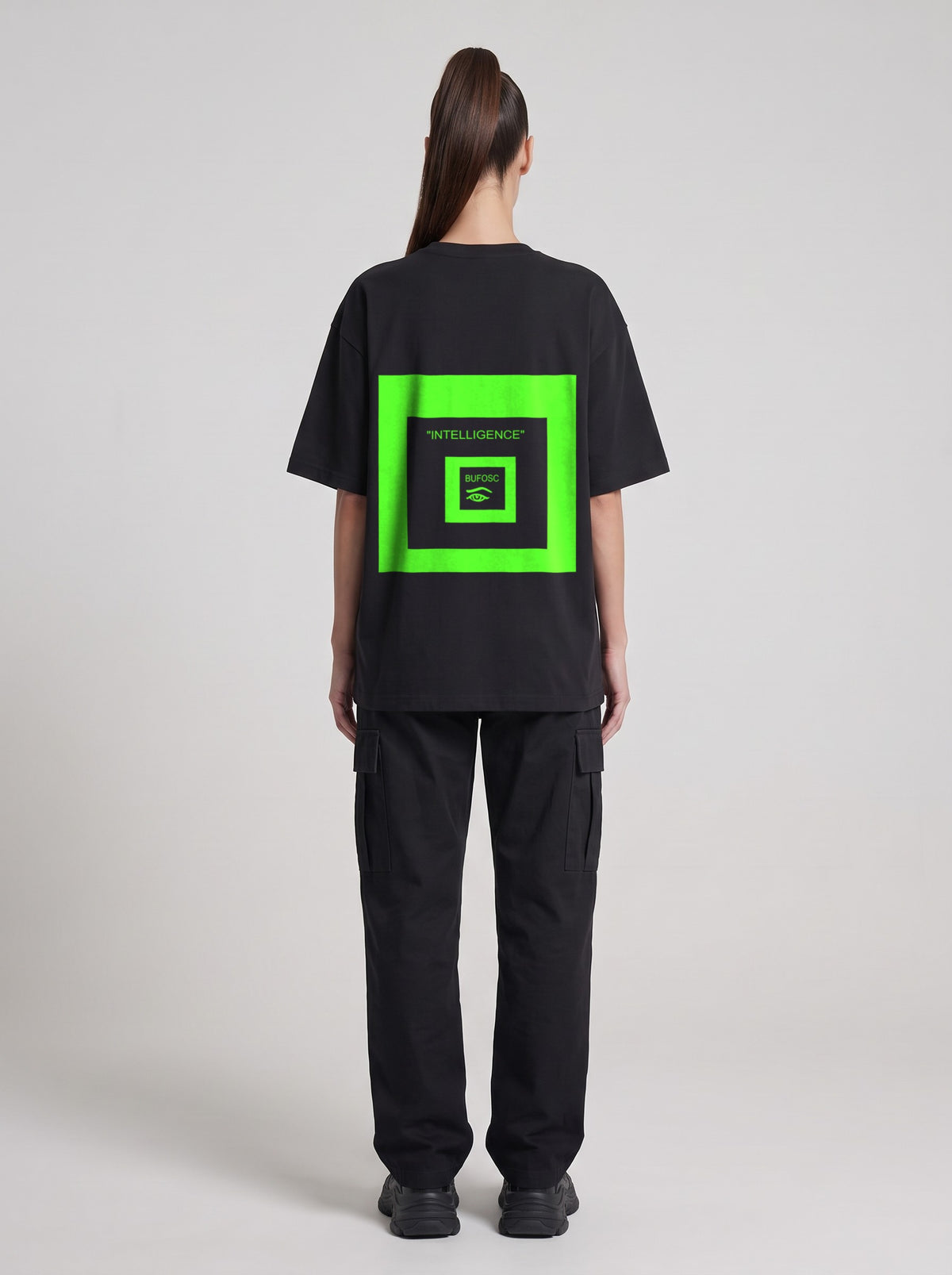 Intelligence Neon — Drop Shoulder T-Shirt in Black Beauty, back, worn by female model