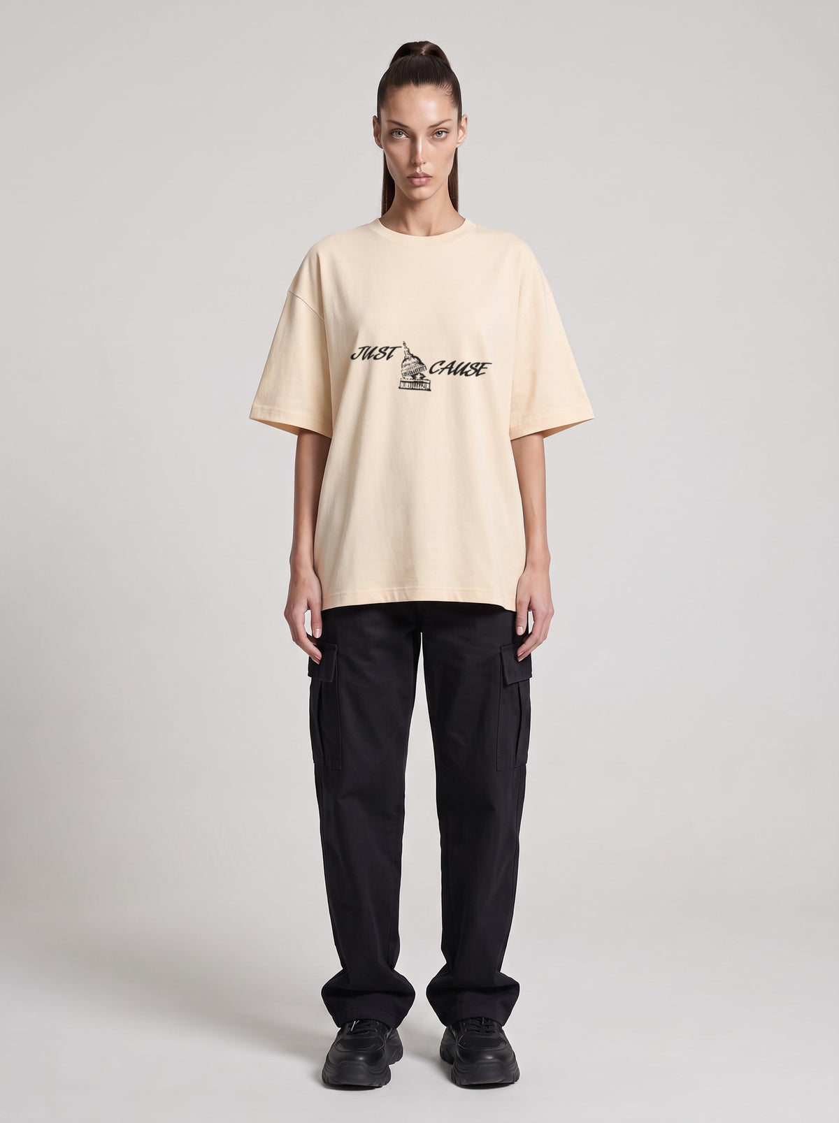 Just Cause — Drop Shoulder T-Shirt in Light Apricot, front, worn by female model