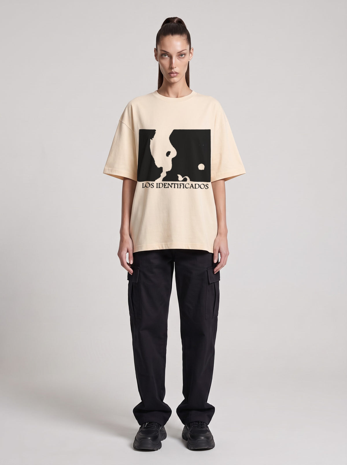 Los Identificados — Drop Shoulder T-Shirt in Light Apricot, front, worn by female model