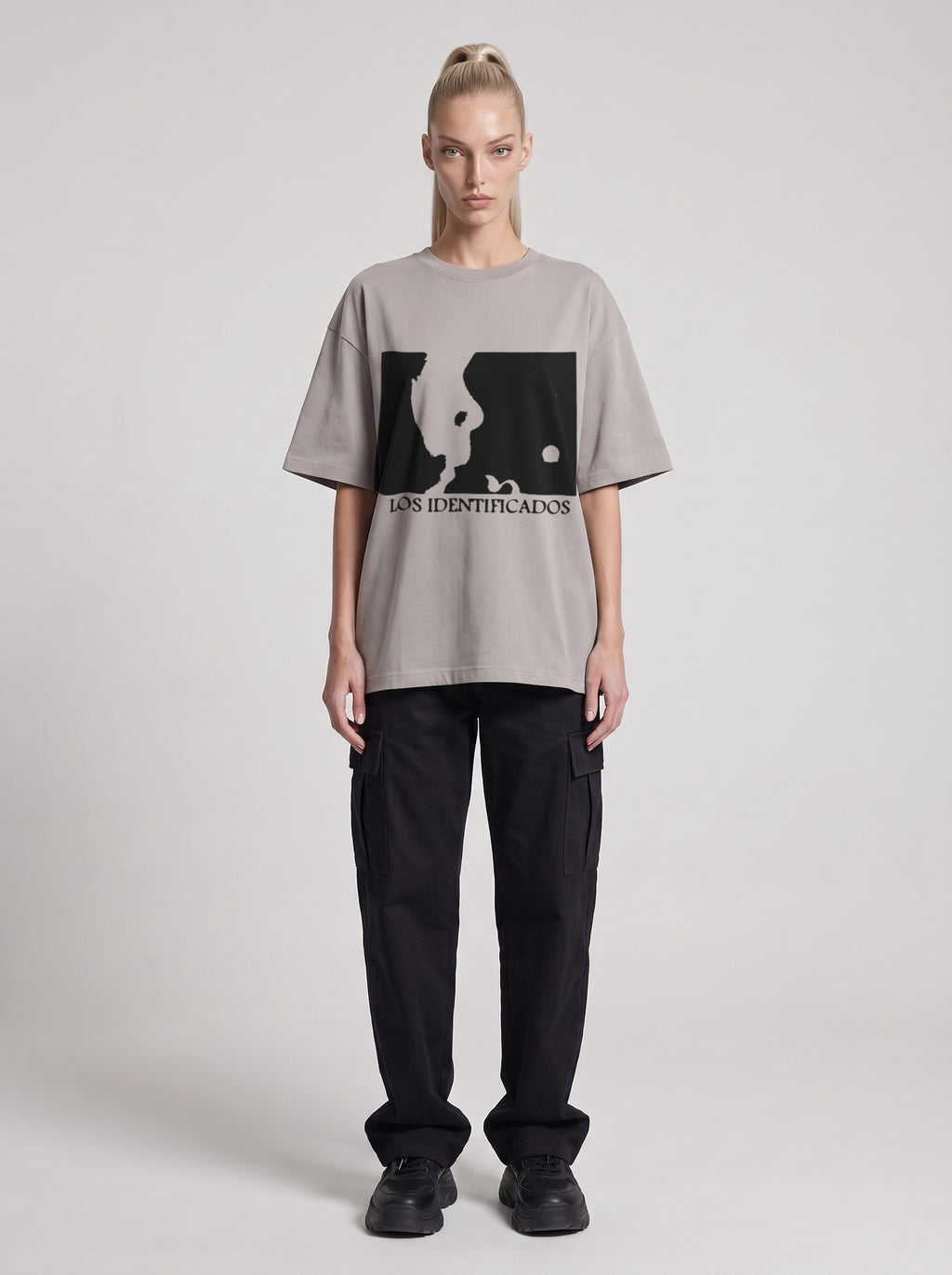 Los Identificados — Drop Shoulder T-Shirt in Light Gray, front, worn by female model
