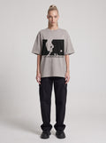 Los Identificados — Drop Shoulder T-Shirt in Light Gray, front, worn by female model