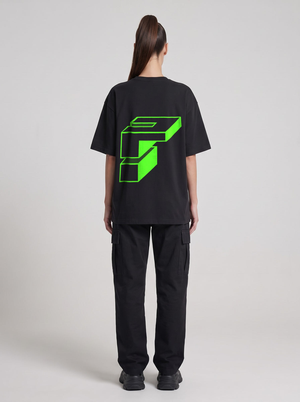 Monolith Neon — Drop Shoulder T-Shirt in Black Beauty, back, worn by female model