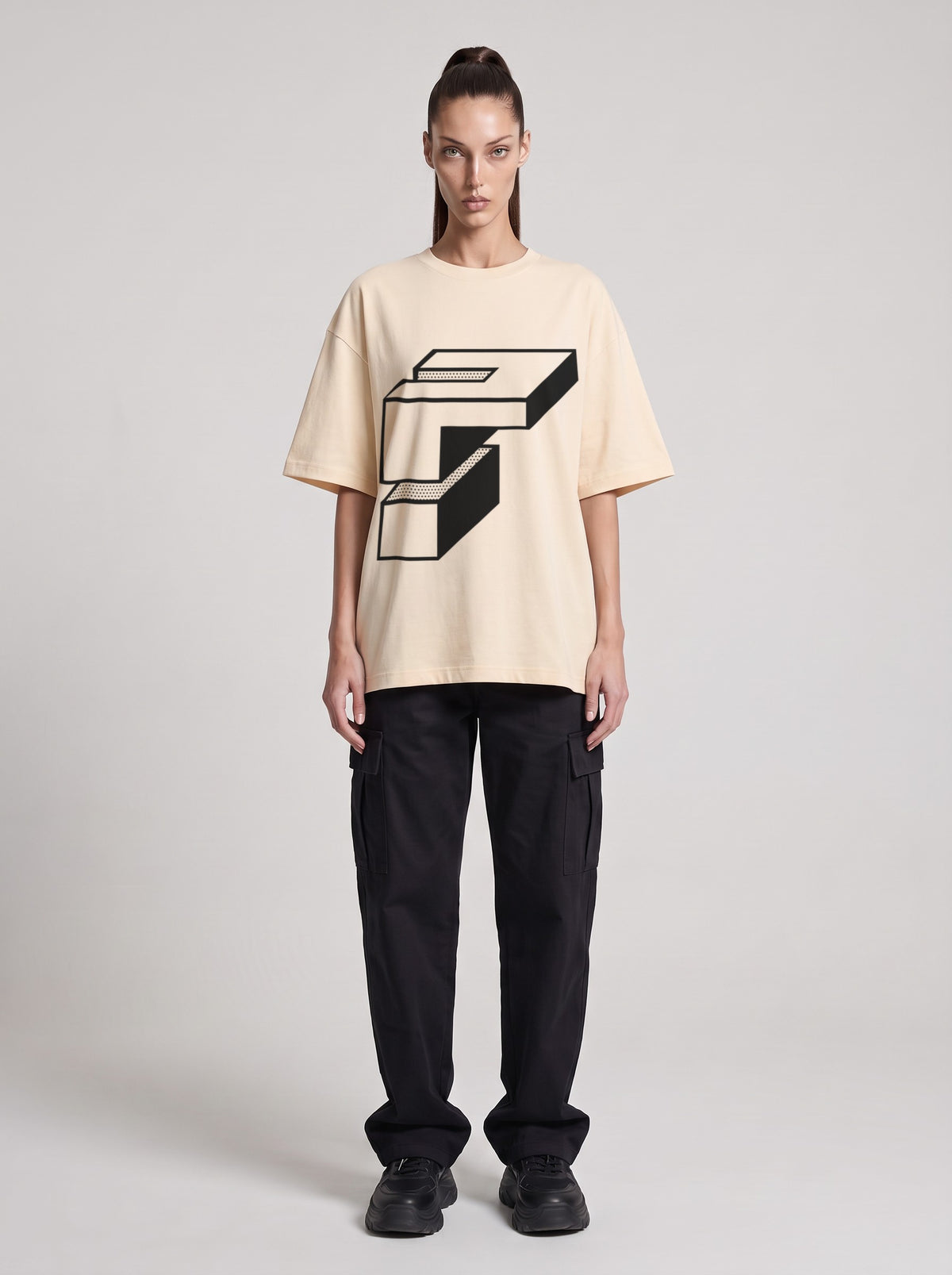 Monolith — Drop Shoulder T-Shirt in Light Apricot, front, worn by female model