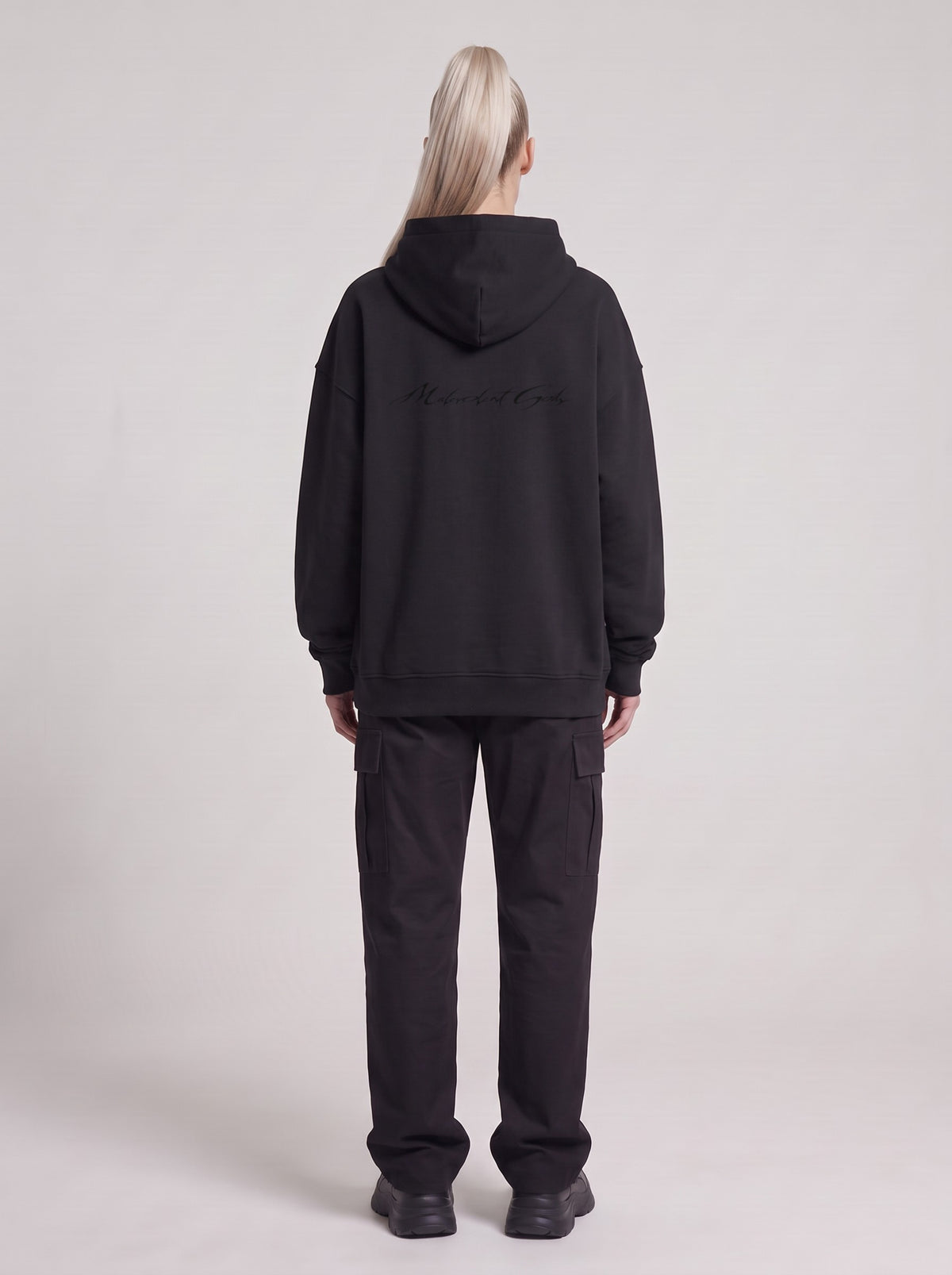 Paranet — Boxy Hoodie in Black, back, worn by female model