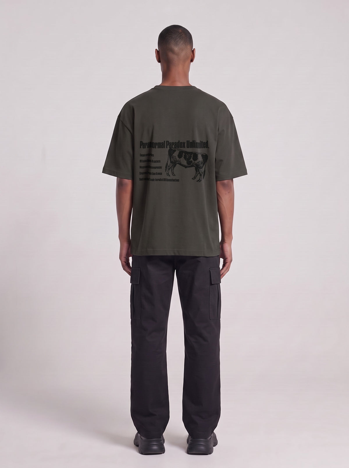 Paranormal Paradox — Drop Shoulder T-Shirt in Dark Gray, back, worn by male model