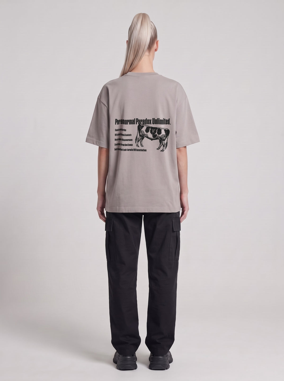 Paranormal Paradox — Drop Shoulder T-Shirt in Light Gray, back, worn by male model