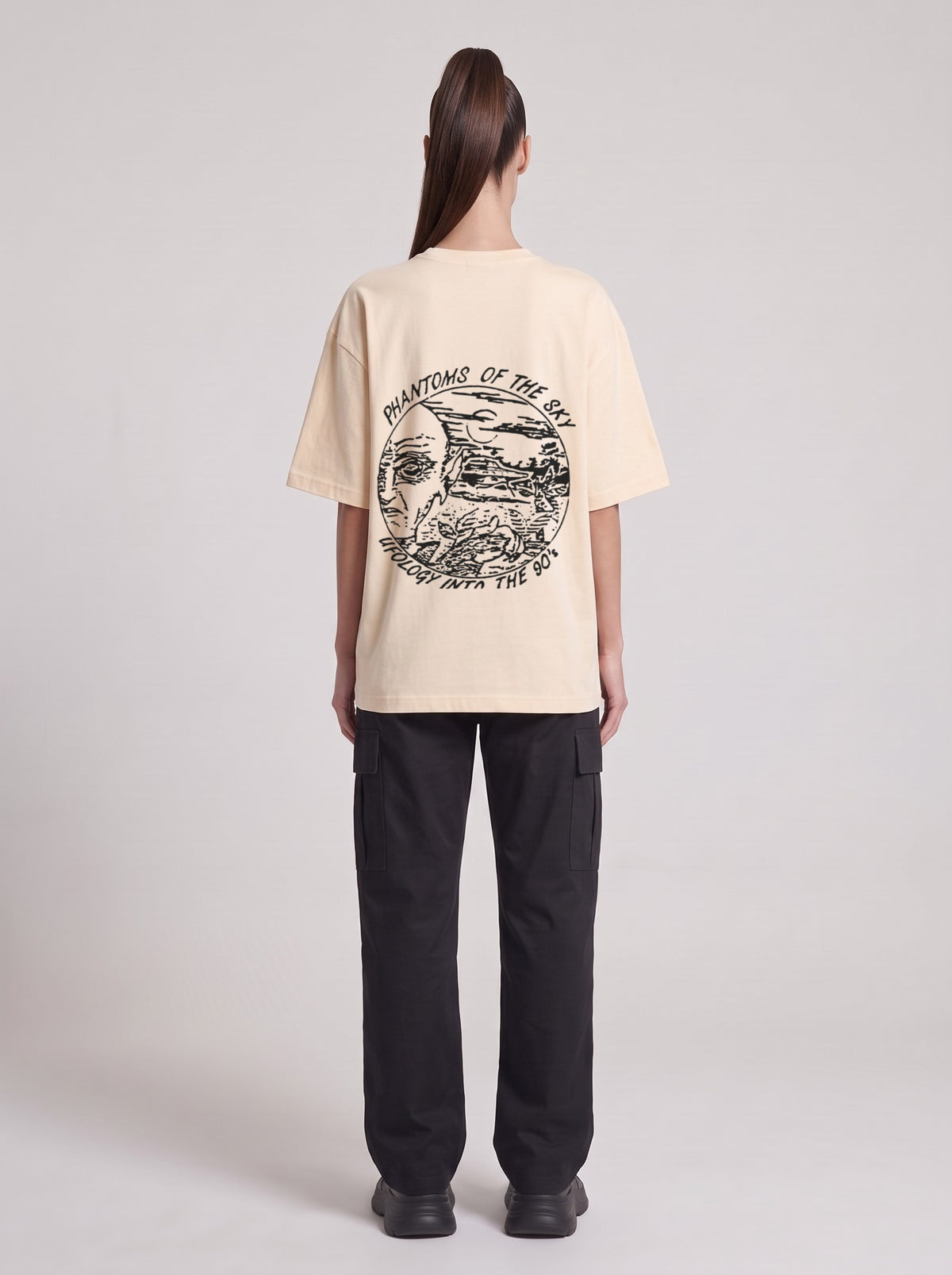 Phantoms of the Sky — Drop Shoulder T-Shirt in Light Apricot, back, worn by female model