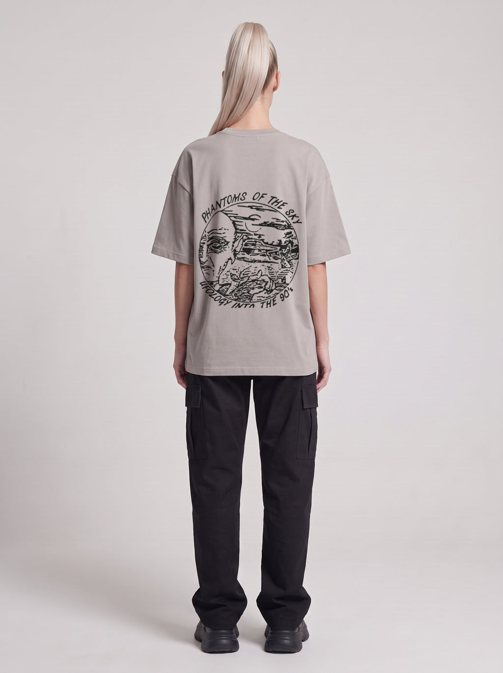 Phantoms of the Sky — Drop Shoulder T-Shirt in Light Gray, back, worn by female model