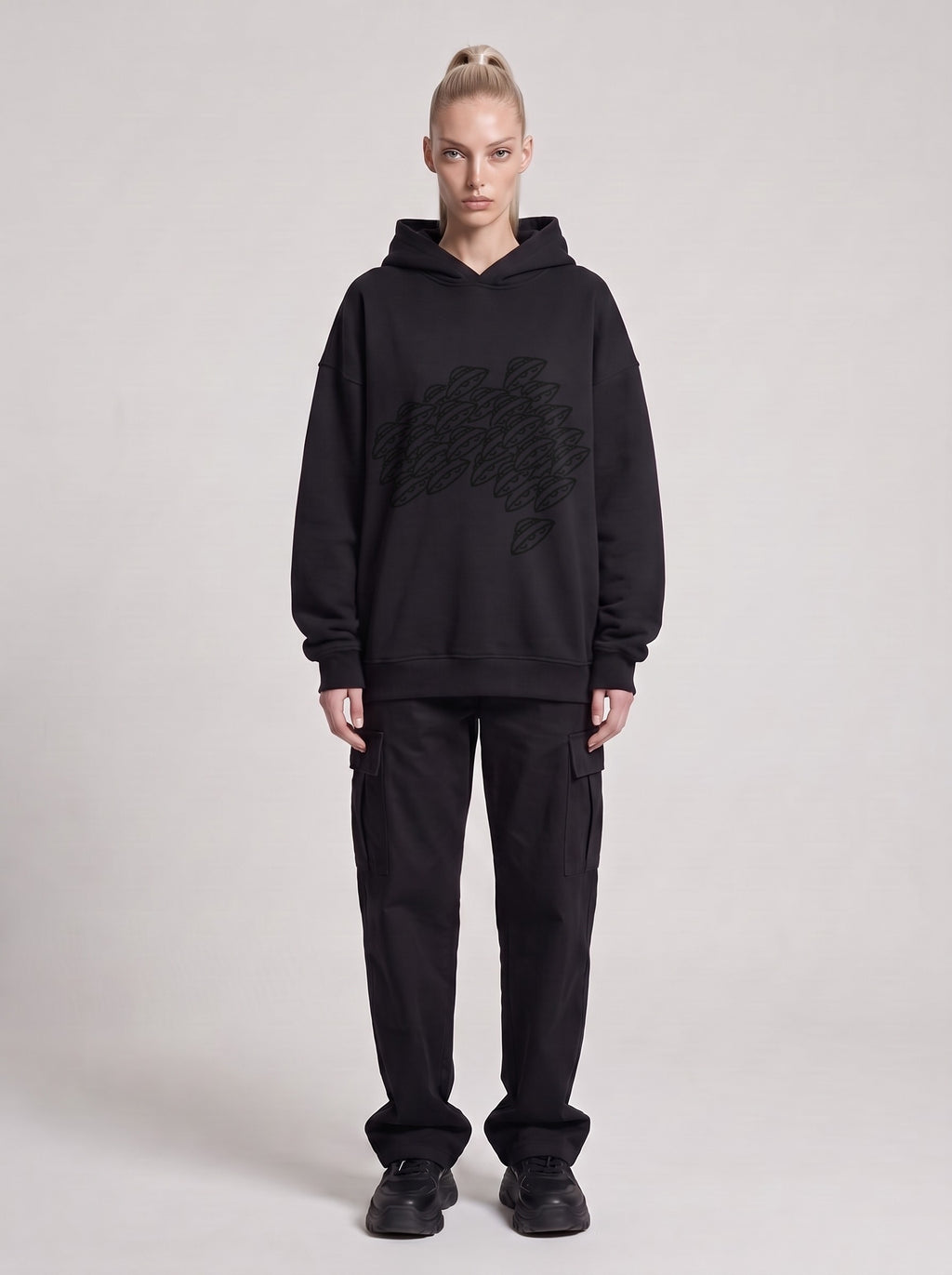 Saucer Fleet — Boxy Hoodie in Black, front, worn by male model