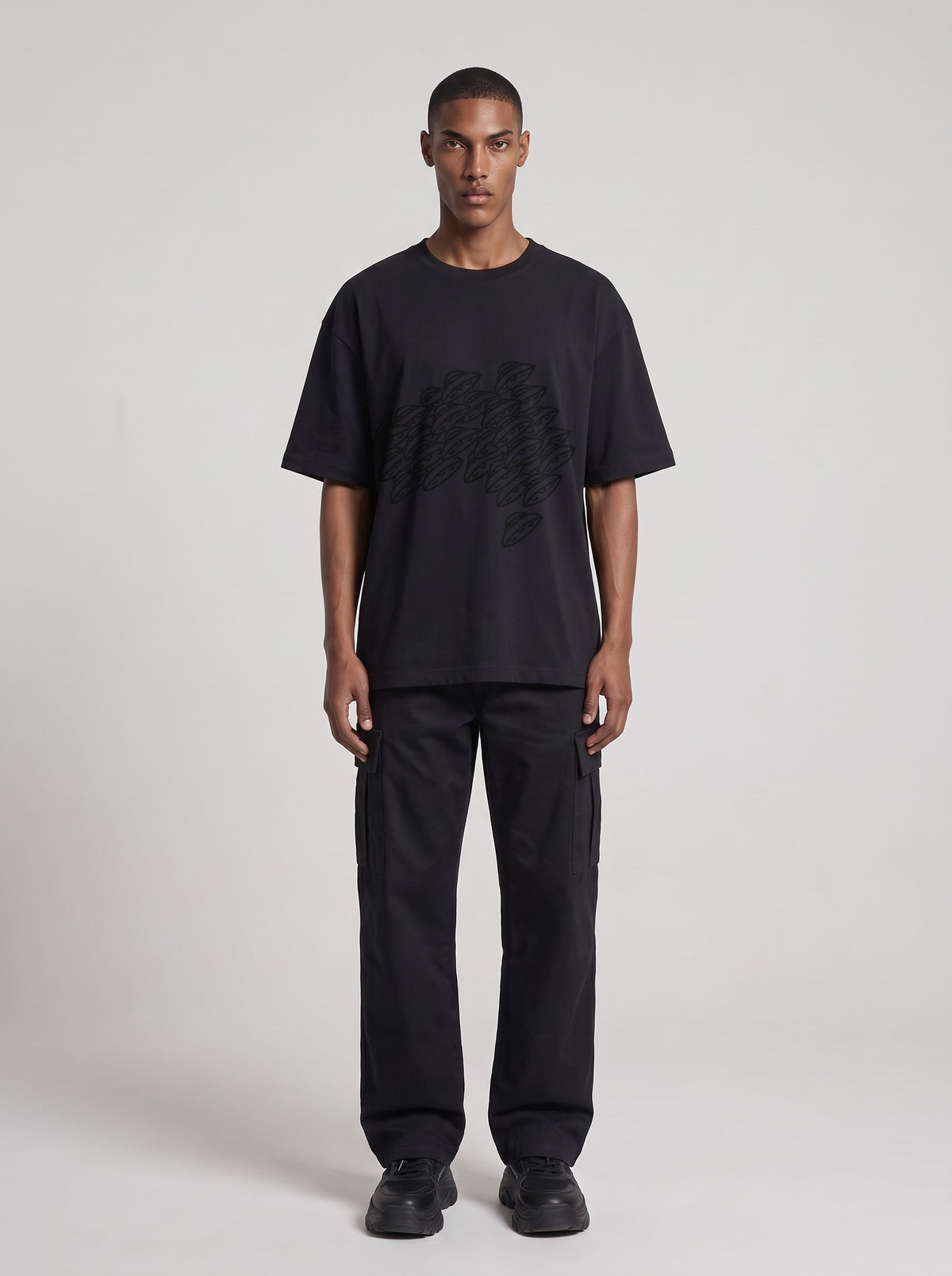 Saucer Fleet — Drop Shoulder T-Shirt in Black Beauty, front, worn by male model