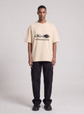 Sensitive Research — Drop Shoulder T-Shirt in Light Apricot, front, worn by male model