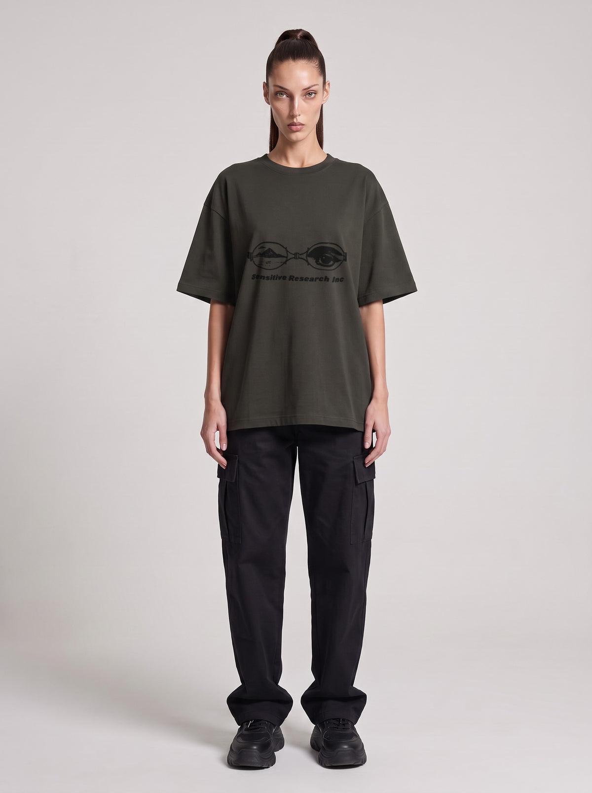 Sensitive Research — Drop Shoulder T-Shirt in Dark Gray, front, worn by female model
