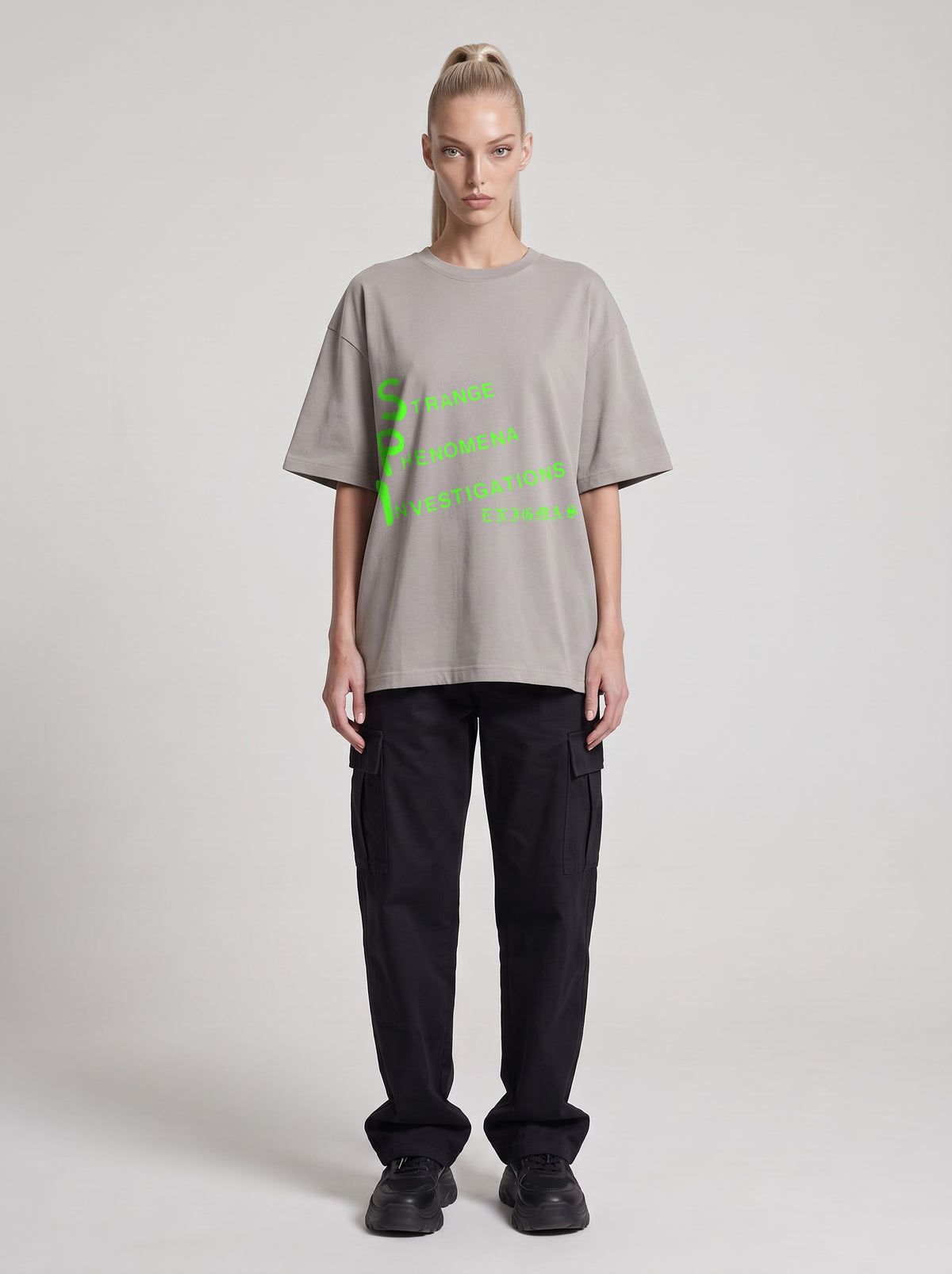 Strange Phenomena Neon — Drop Shoulder T-Shirt in Light Gray, front, worn by female model