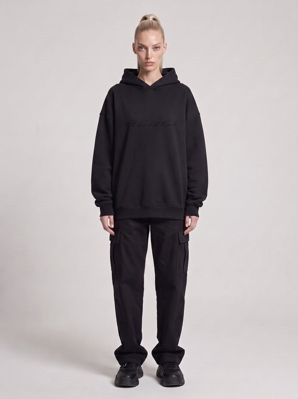 Symposium 1993 — Boxy Hoodie in Black, front, worn by male model