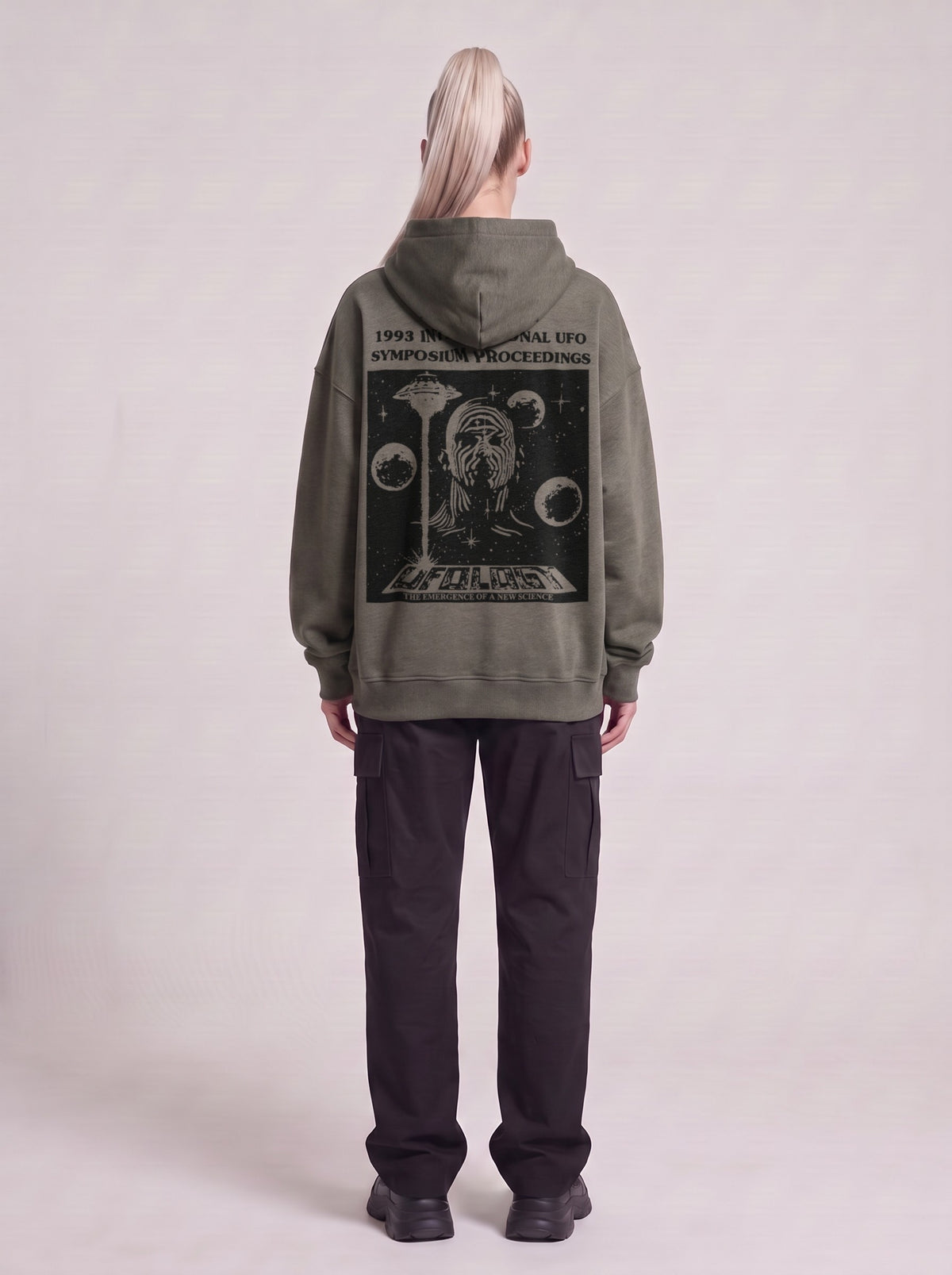 Symposium 1993 — Boxy Hoodie in Dark Gray, back, worn by male model
