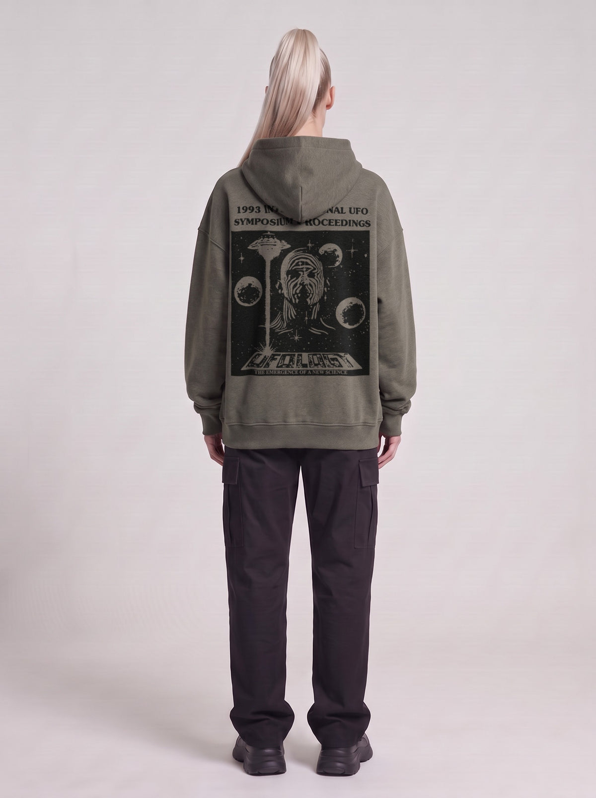 Symposium 1993 — Boxy Hoodie in Dark Gray, back, worn by female model