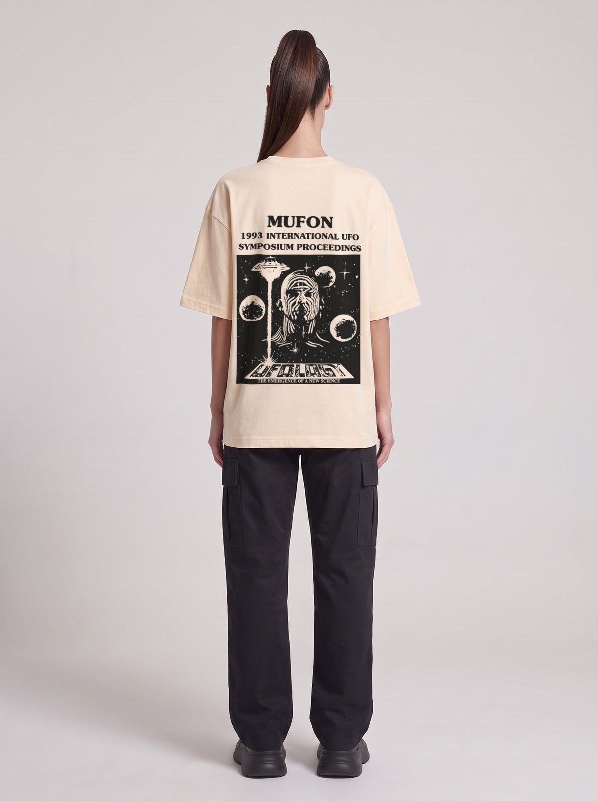 Symposium 1993 — Drop Shoulder T-Shirt in Light Apricot, back, worn by female model
