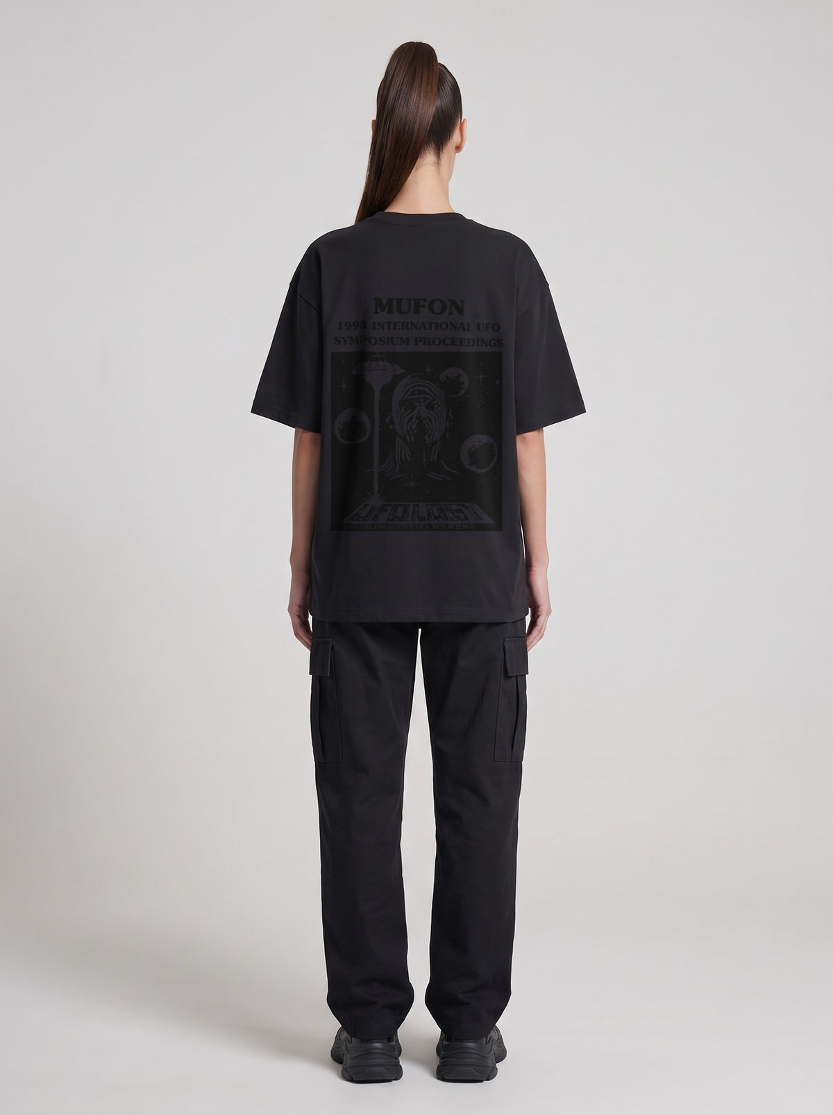 Symposium 1993 — Drop Shoulder T-Shirt in Black Beauty, back, worn by female model