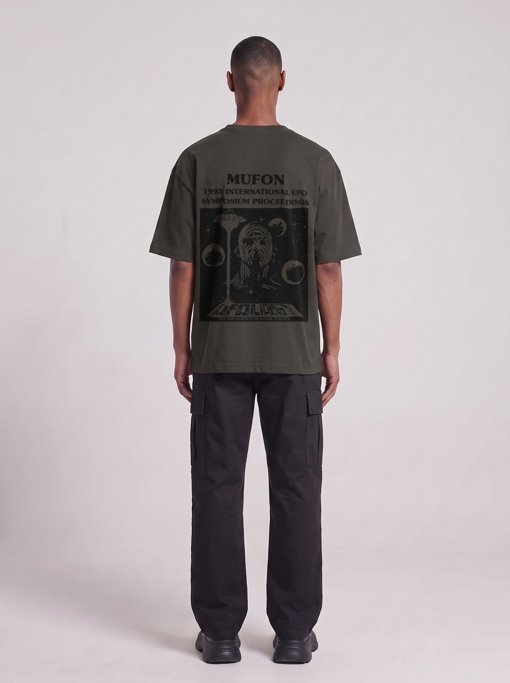 Symposium 1993 — Drop Shoulder T-Shirt in Dark Gray, back, worn by male model