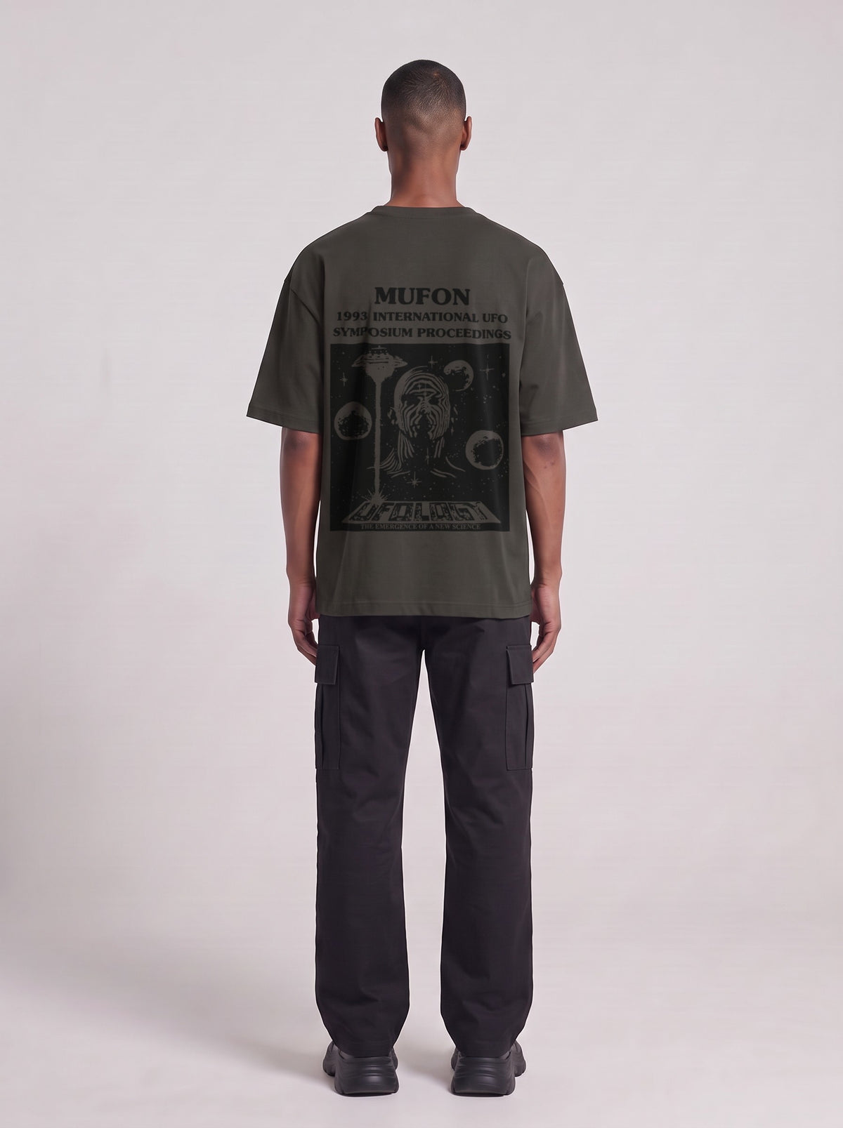 Symposium 1993 — Drop Shoulder T-Shirt in Dark Gray, back, worn by male model