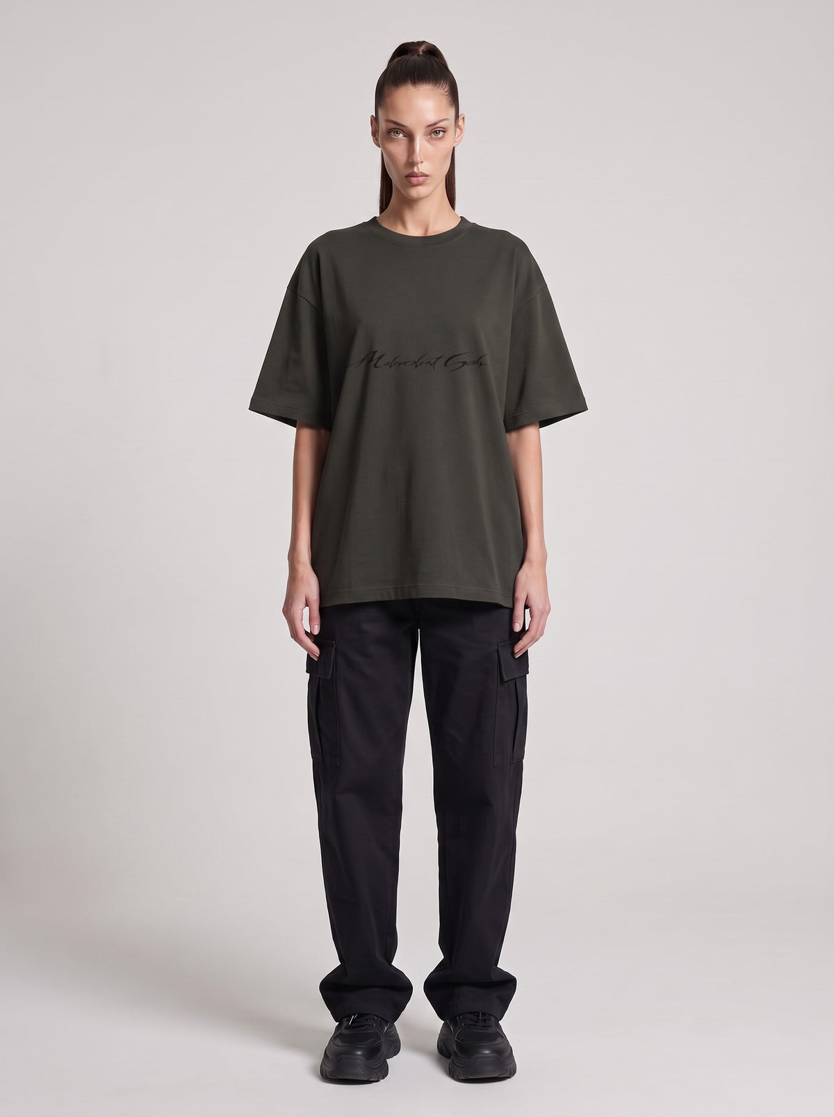 Symposium 1993 — Drop Shoulder T-Shirt in Dark Gray, front, worn by female model