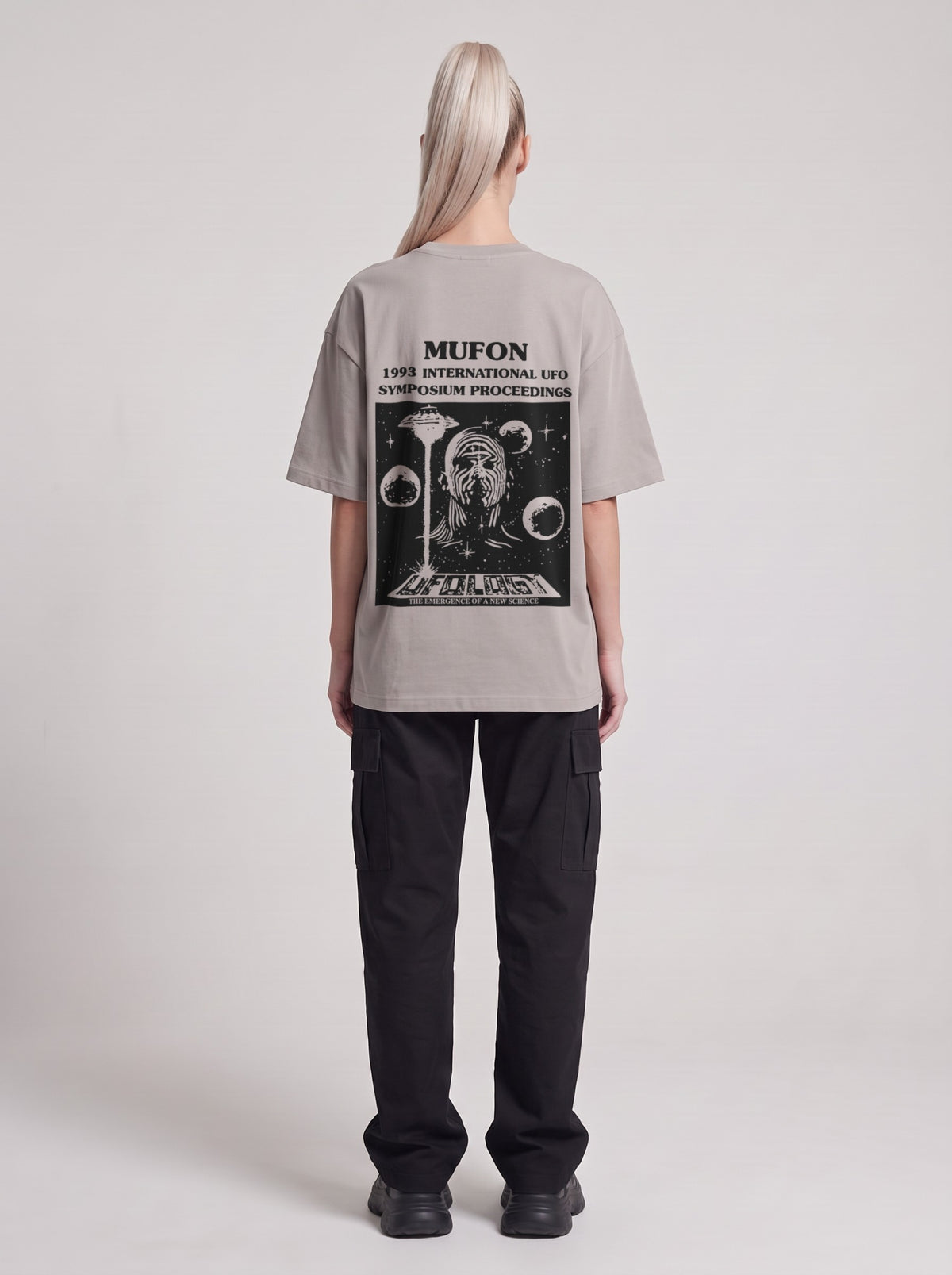 Symposium 1993 — Drop Shoulder T-Shirt in Light Gray, back, worn by female model
