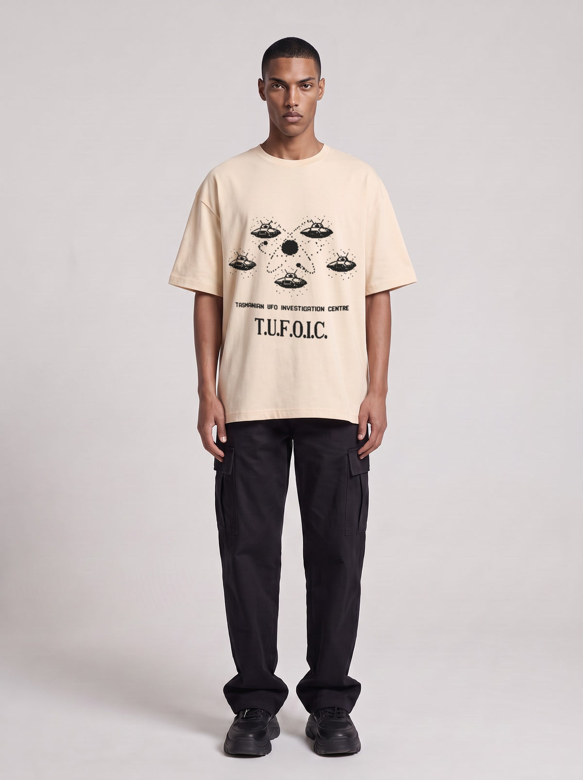 T.U.F.O.I.C. — Drop Shoulder T-Shirt in Light Apricot, front, worn by male model