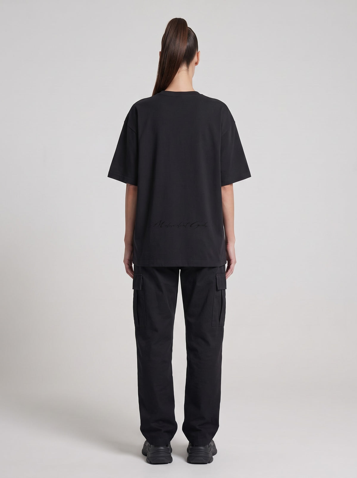 T.U.F.O.I.C. — Drop Shoulder T-Shirt in Black Beauty, back, worn by female model