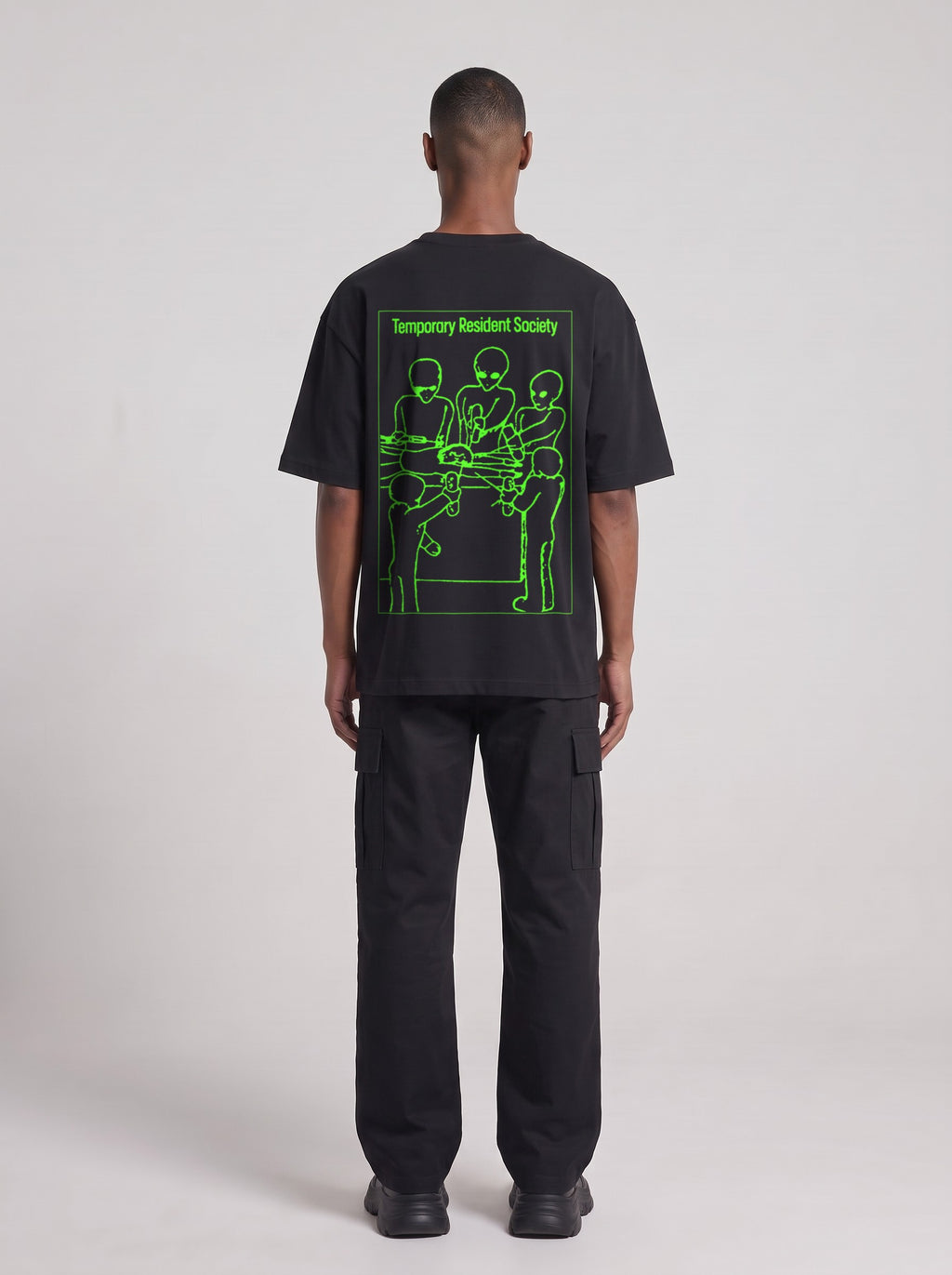 Temporary Resident Society Neon — Drop Shoulder T-Shirt in Black Beauty, back, worn by male model