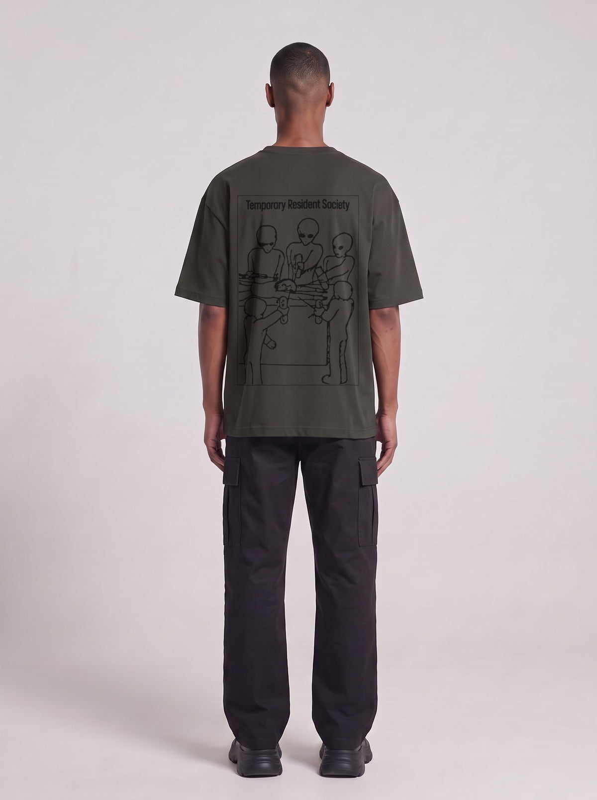 Temporary Resident Society — Drop Shoulder T-Shirt in Dark Gray, back, worn by male model