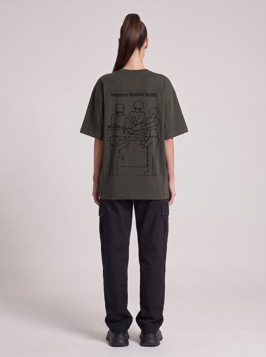 Temporary Resident Society — Drop Shoulder T-Shirt in Dark Gray, back, worn by female model